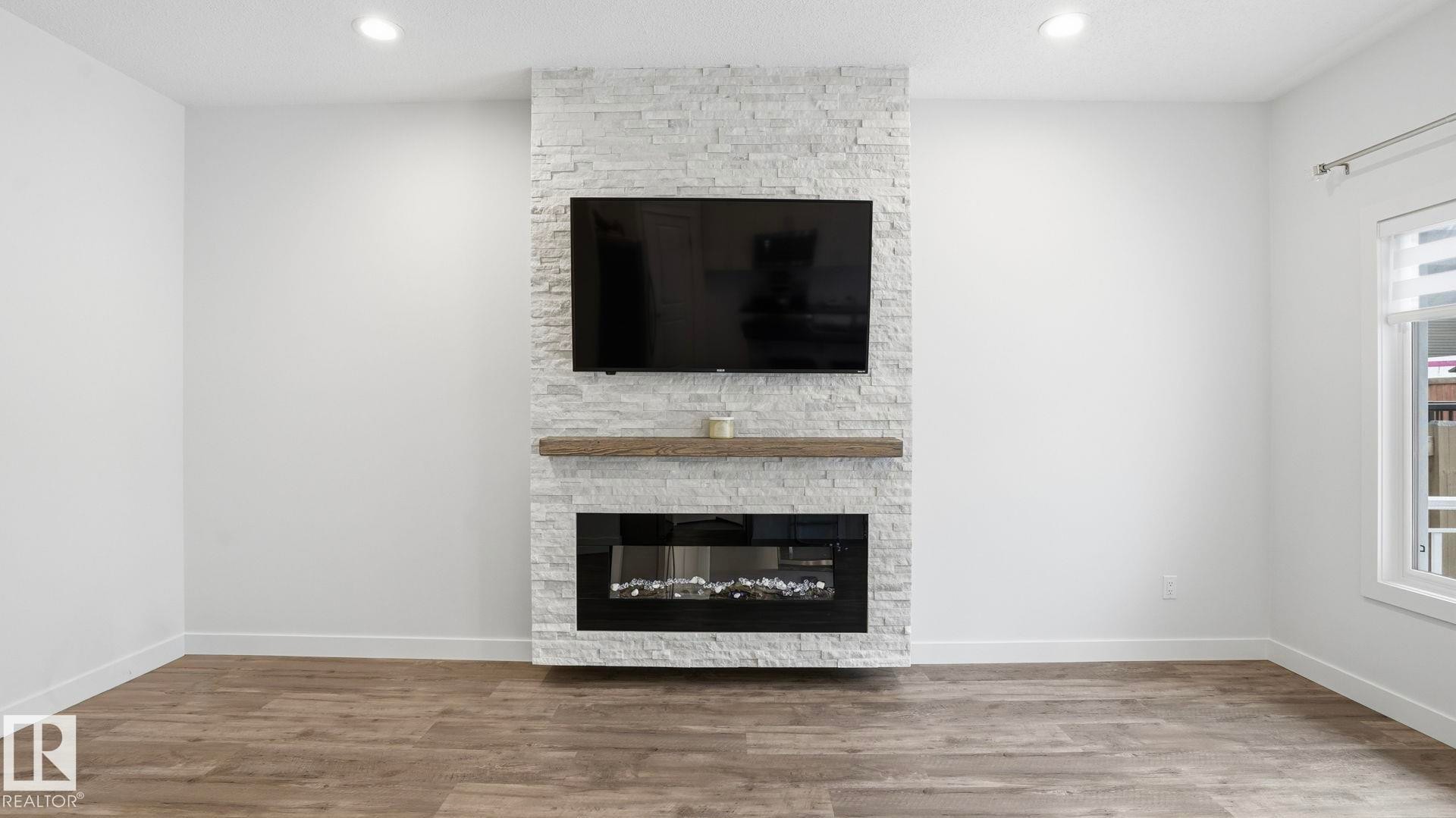 4112 171 Avenue, Edmonton, AB - Indoor Photo Showing Living Room With Fireplace