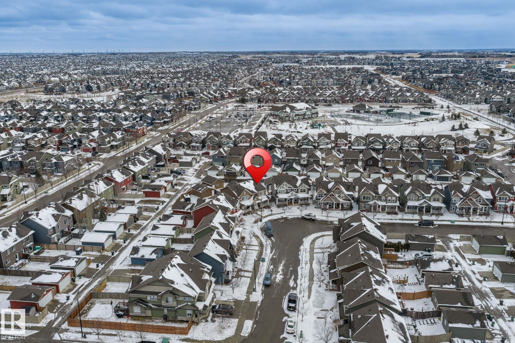 Aerial view showcasing the residential community with streets and numerous properties - 4783 Crabapplle Run, Edmonton, AB - Outdoor With View
