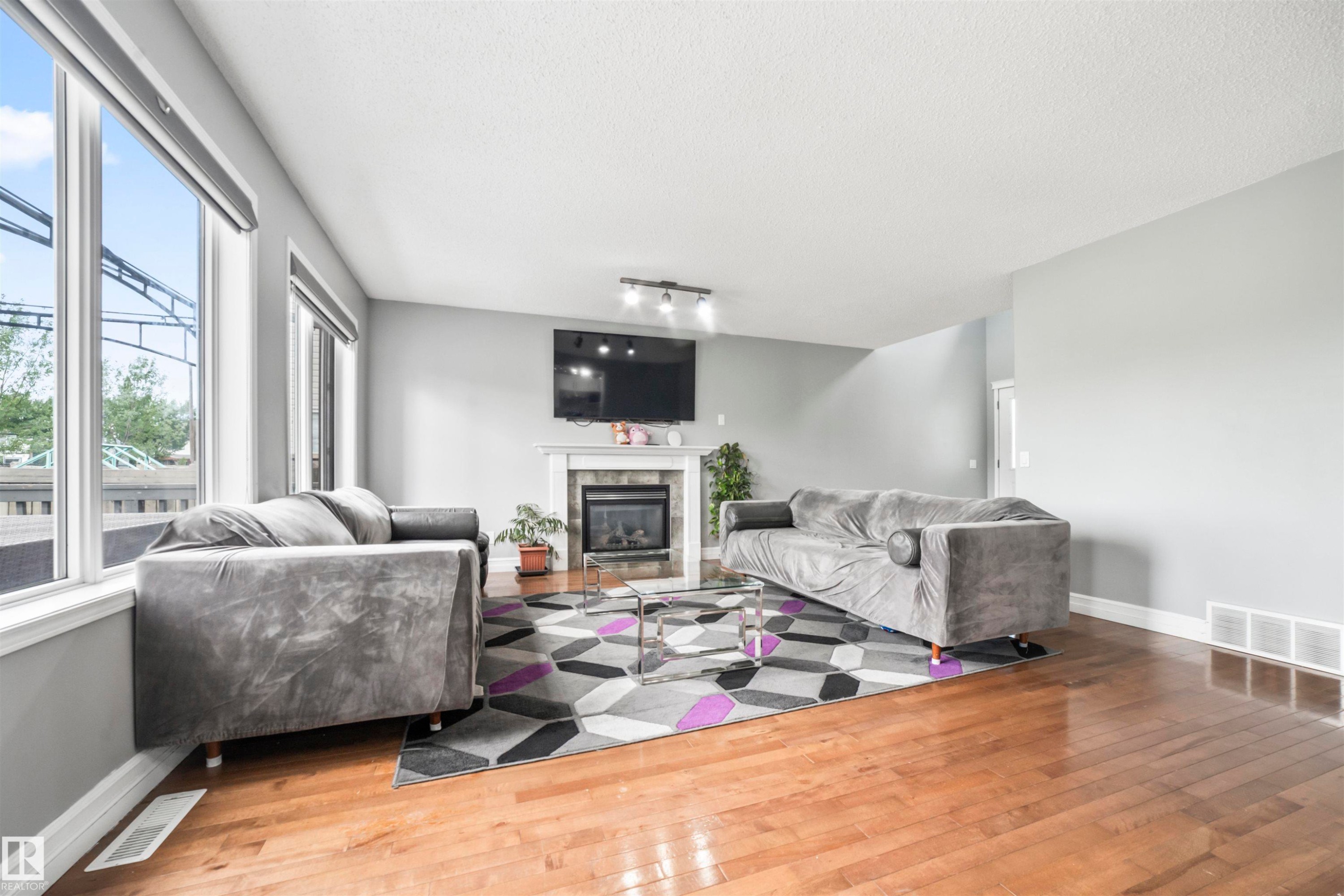 324 79 Street, Edmonton, AB - Indoor Photo Showing Living Room With Fireplace
