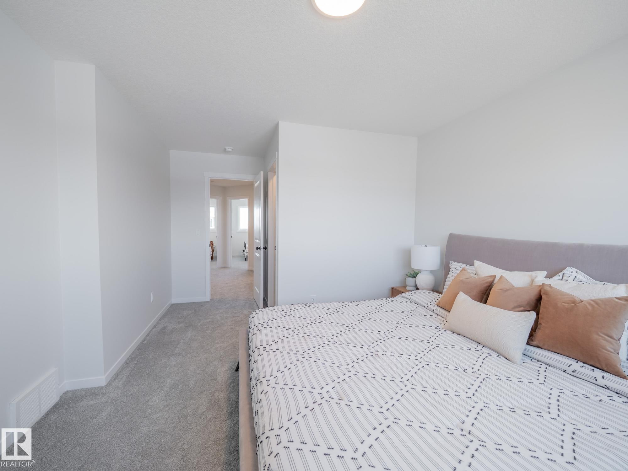 6 Brougham Drive, Ardrossan, AB - Indoor Photo Showing Bedroom