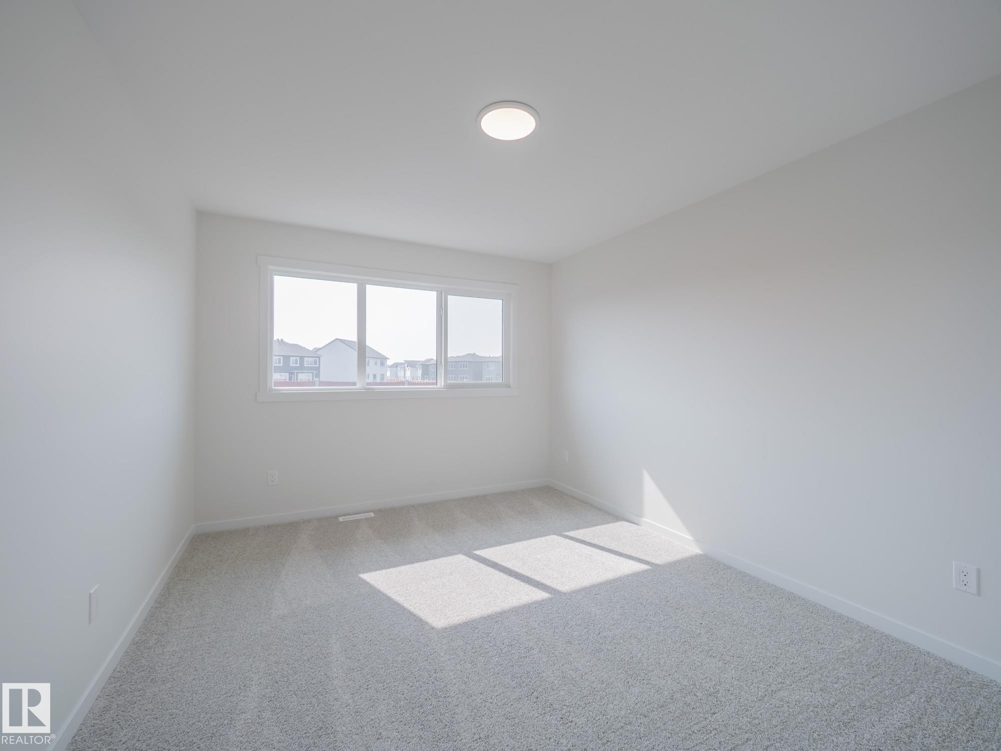 2 Elis Link, Spruce Grove, AB - Indoor Photo Showing Other Room