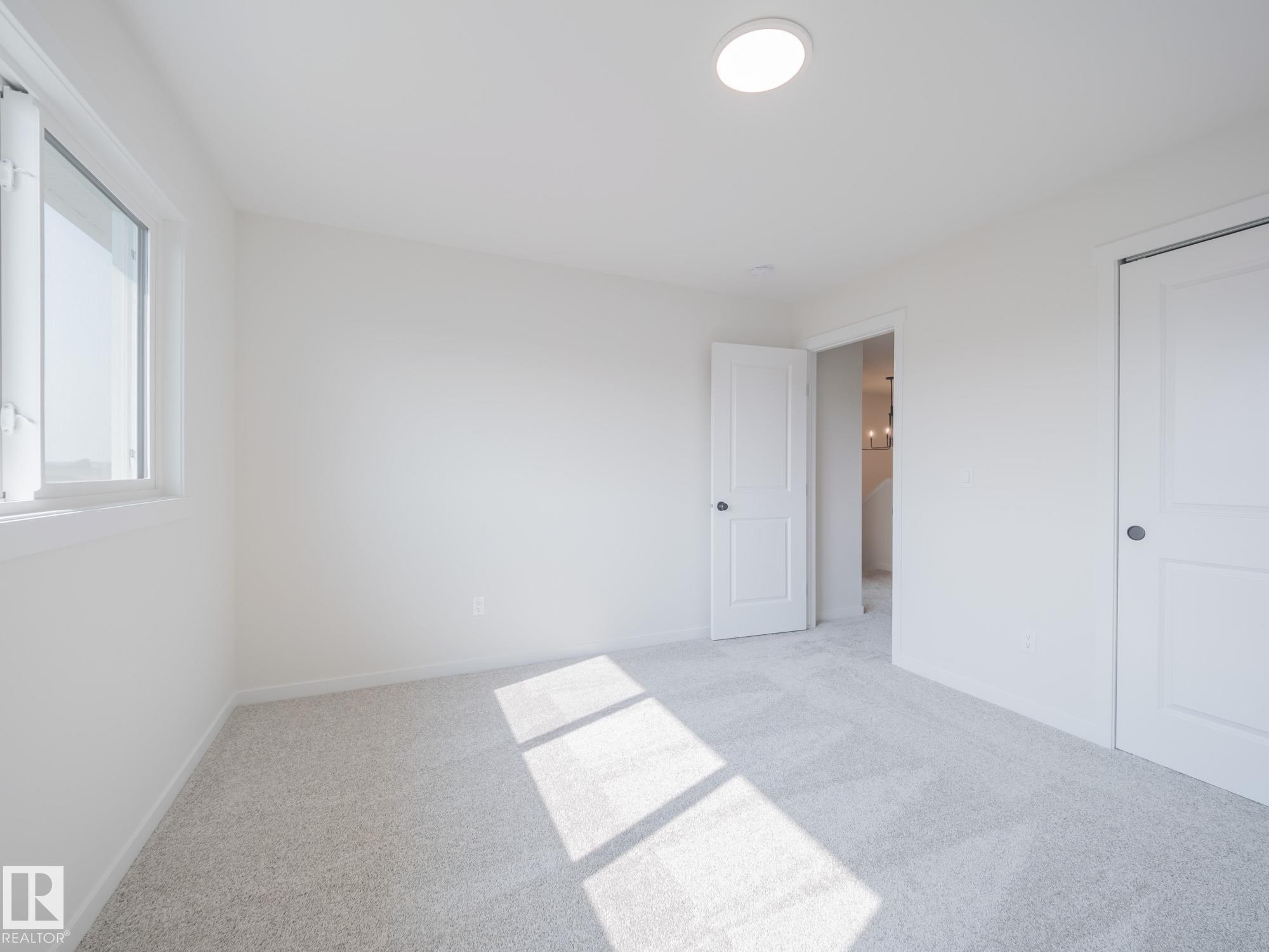 2 Elis Link, Spruce Grove, AB - Indoor Photo Showing Other Room