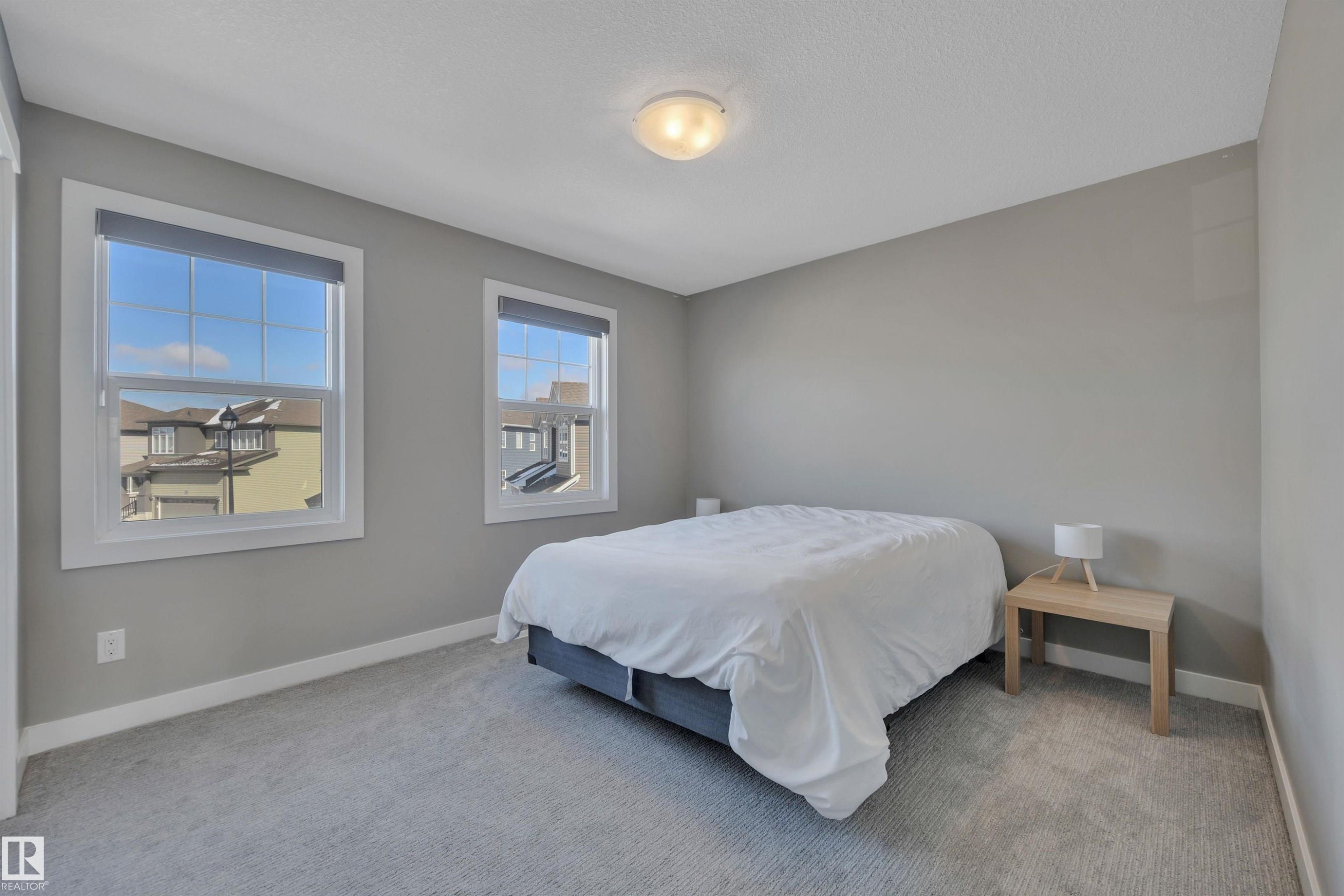 15 Promenade Point(E), Beaumont, AB - Indoor Photo Showing Bedroom