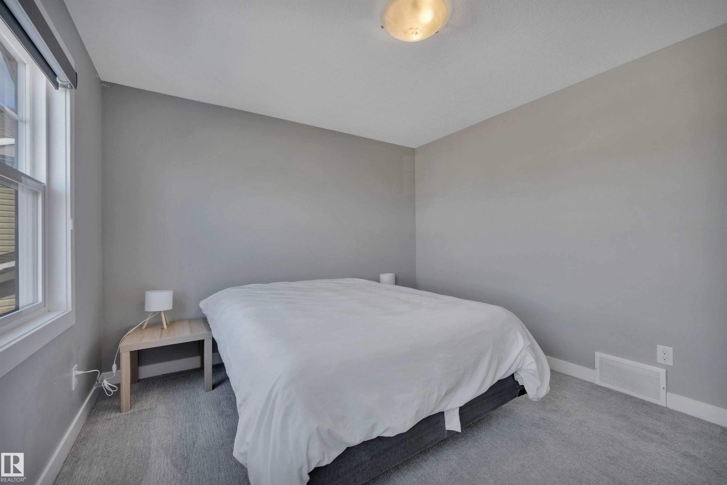 15 Promenade Point(E), Beaumont, AB - Indoor Photo Showing Bedroom