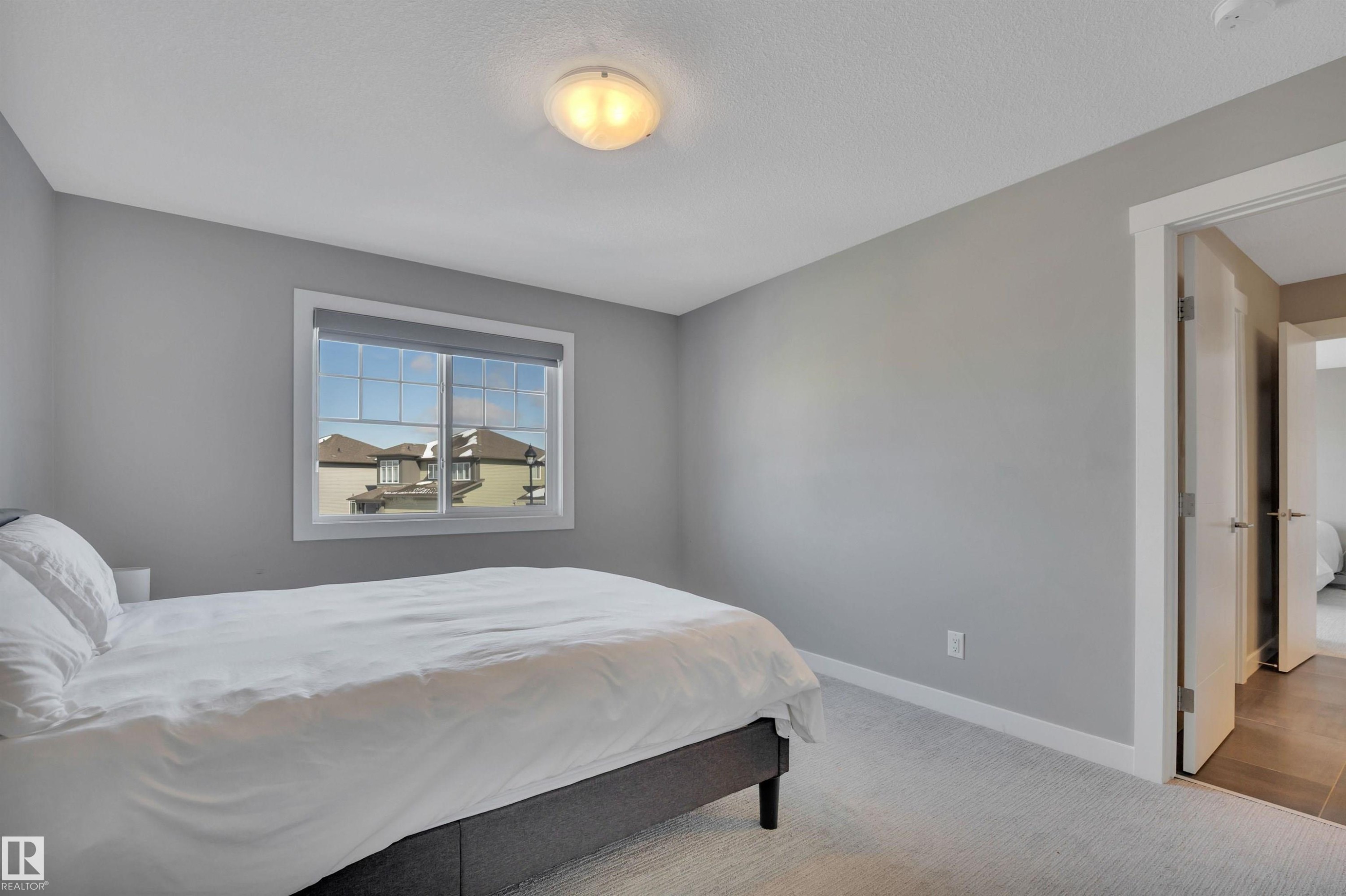 15 Promenade Point(E), Beaumont, AB - Indoor Photo Showing Bedroom