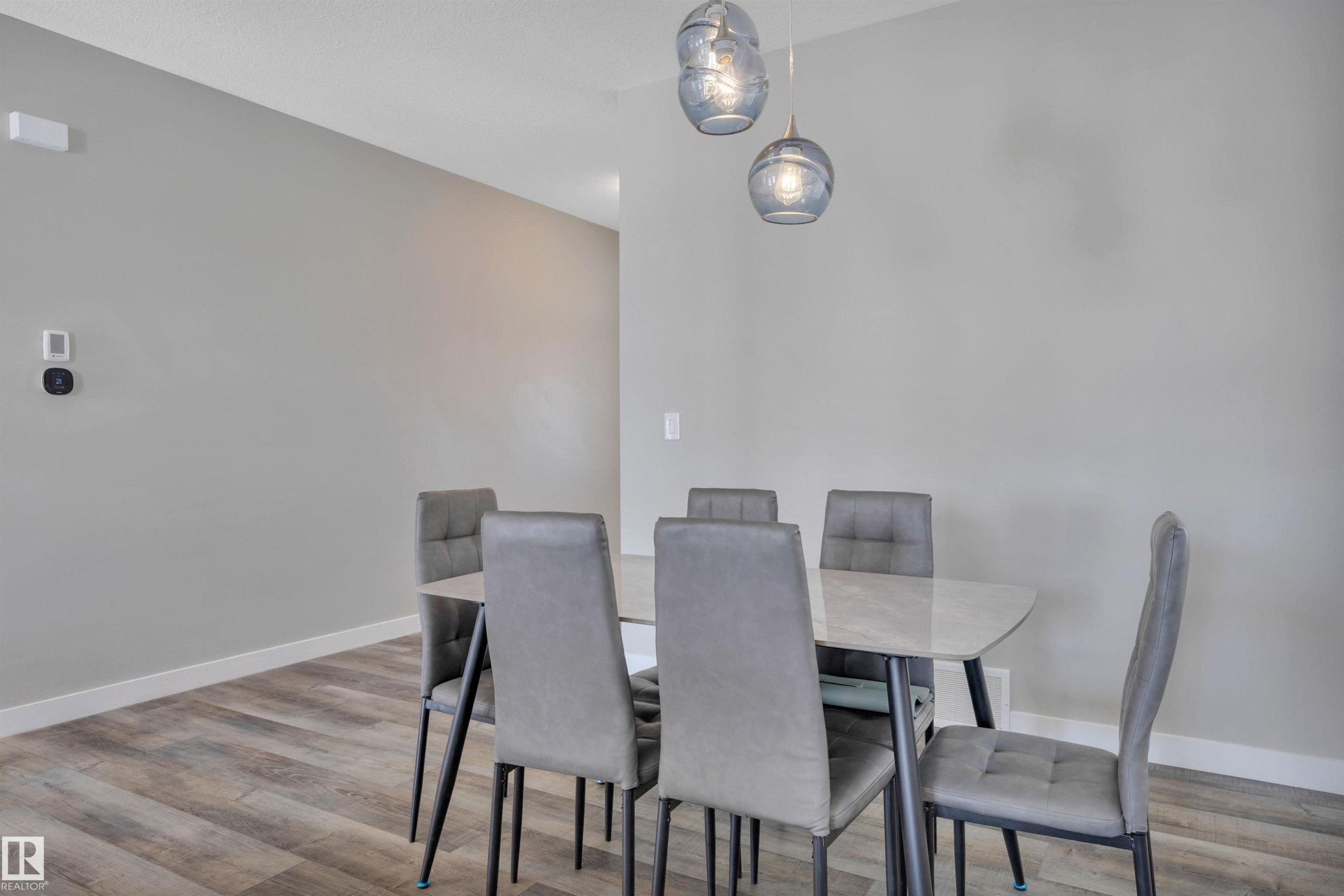 15 Promenade Point(E), Beaumont, AB - Indoor Photo Showing Dining Room