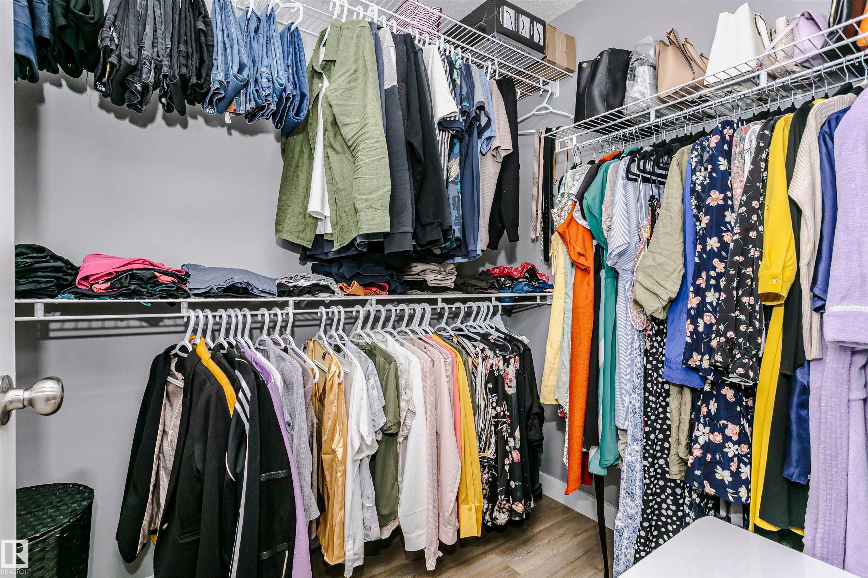 Spacious walk-in closet featuring wire shelving and hanging rods - 21807 97 Avenue, Edmonton, AB - Indoor With Storage
