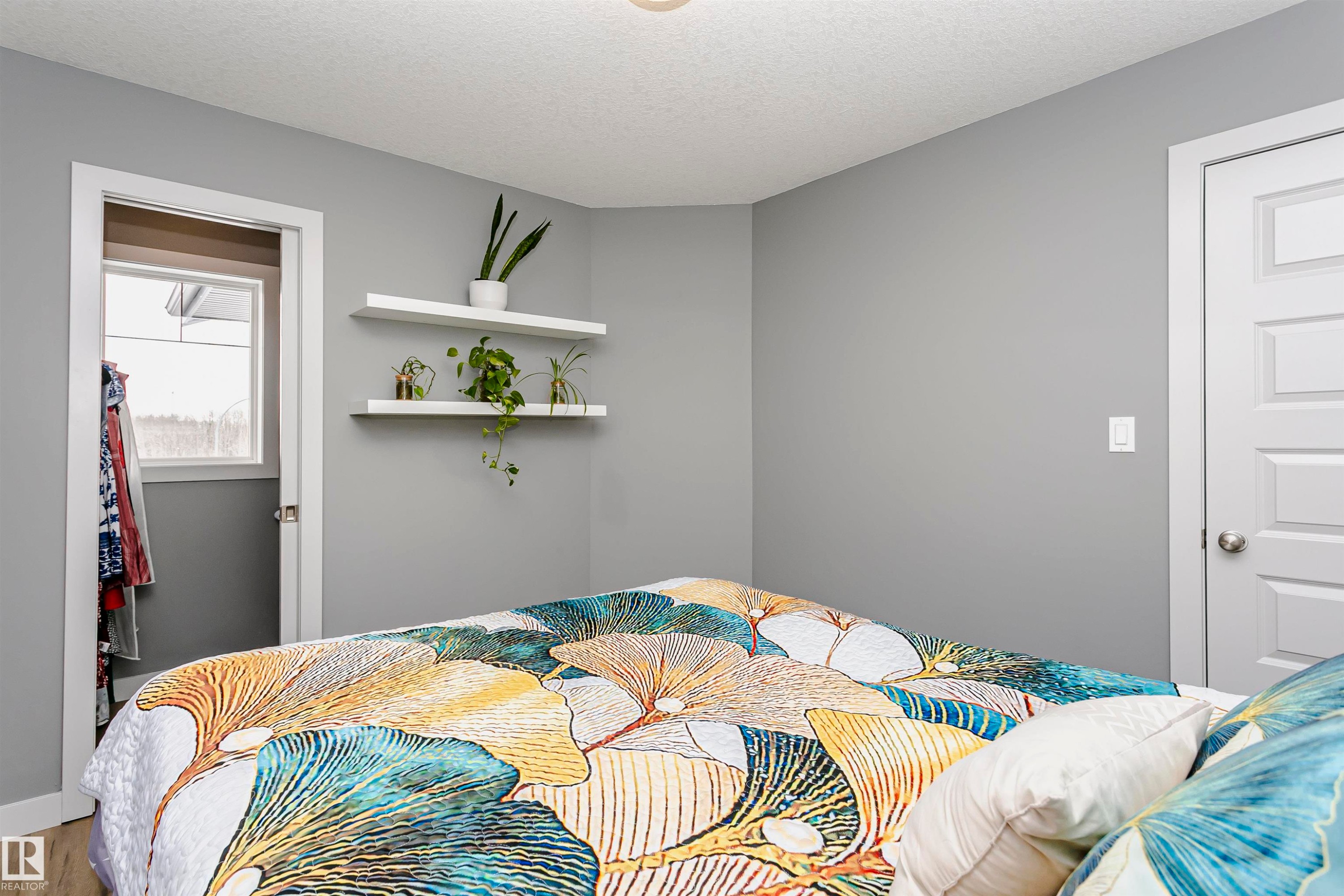 This room features light grey walls and white trim - 21807 97 Avenue, Edmonton, AB - Indoor Photo Showing Bedroom