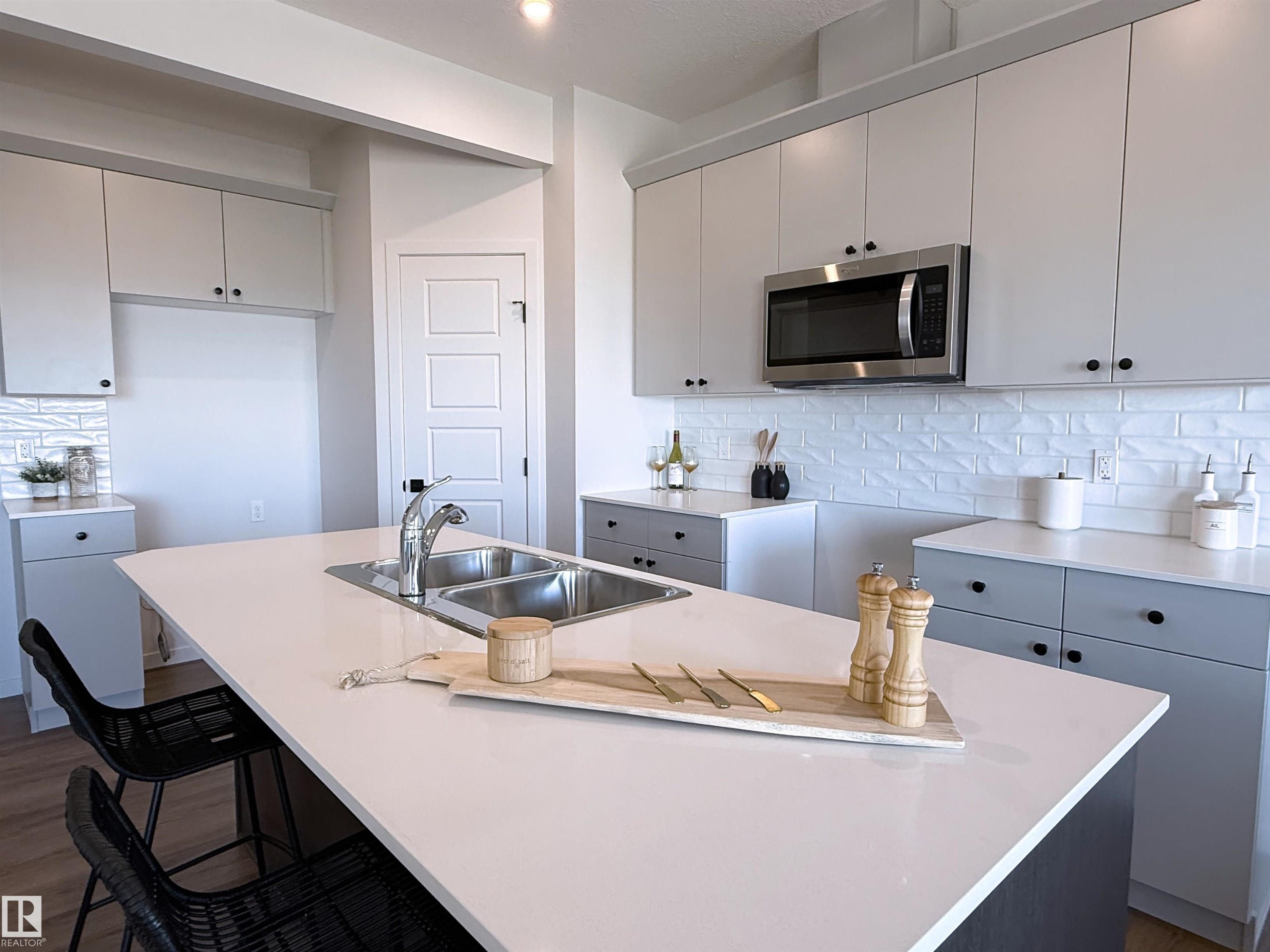 284 Lodge Pole Place, Leduc, AB - Indoor Photo Showing Kitchen With Double Sink