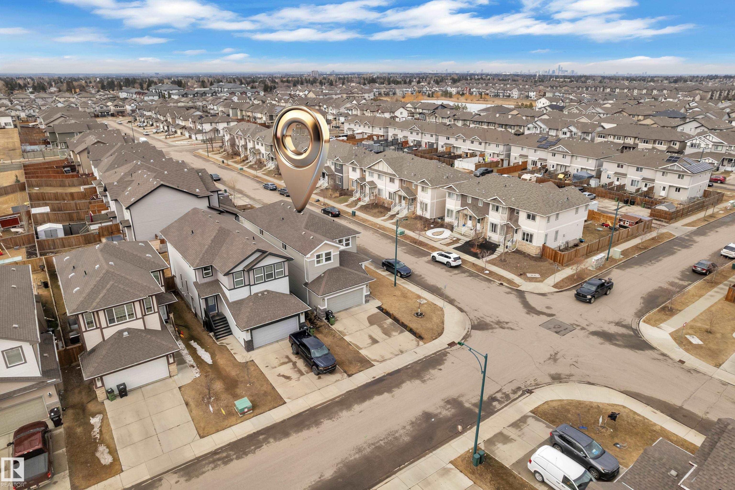 Aerial view of the property and its surrounding neighborhood, showcasing numerous detached homes with pitched roofs and front-facing garages - 1452 30 Street, Edmonton, AB - Outdoor With View