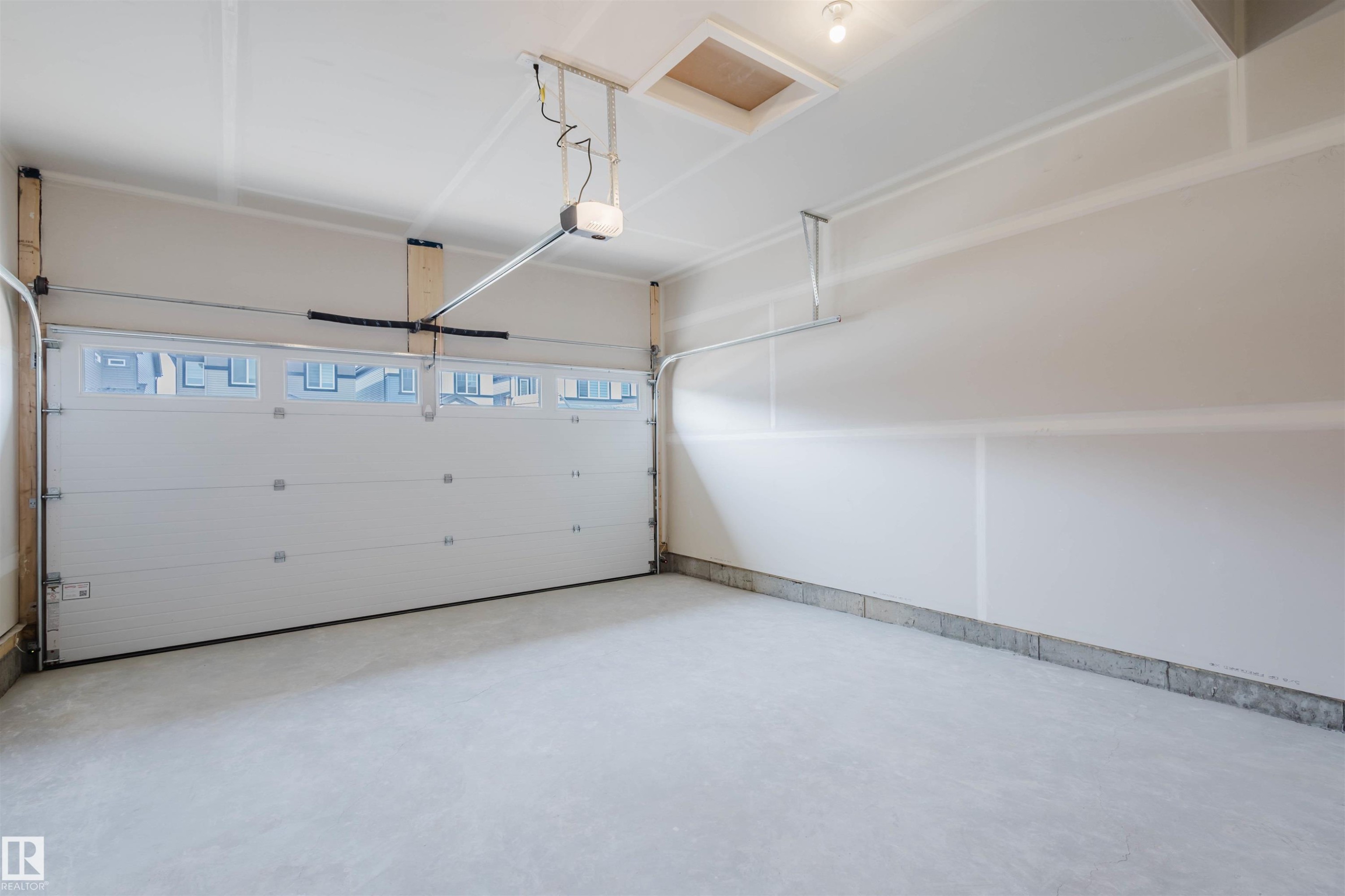 8253 Kiriak Loop Sw, Edmonton, AB - Indoor Photo Showing Garage