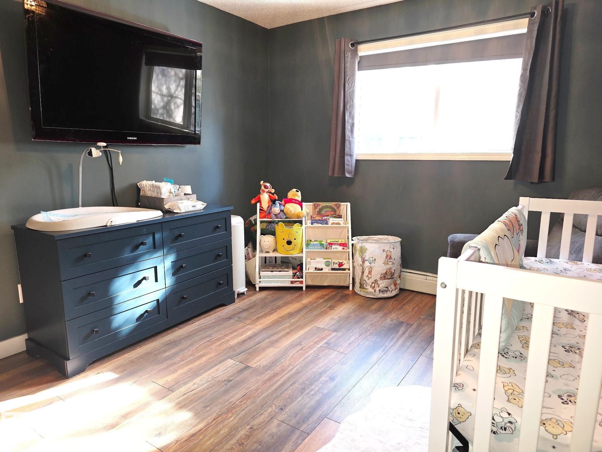 118 2430 Guardian Road, Edmonton, AB - Indoor Photo Showing Bedroom
