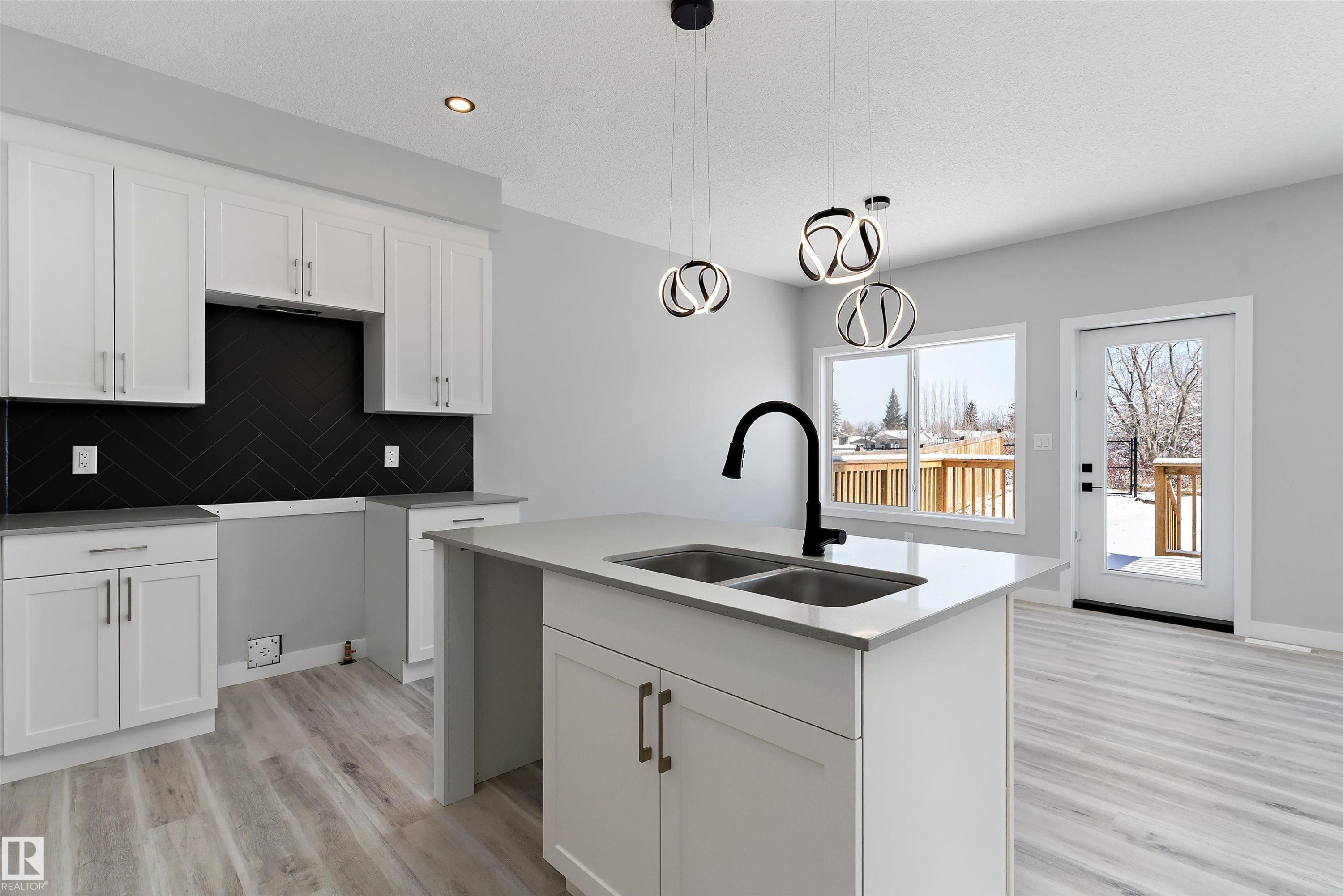 36 Maple Crescent, Gibbons, AB - Indoor Photo Showing Kitchen With Double Sink