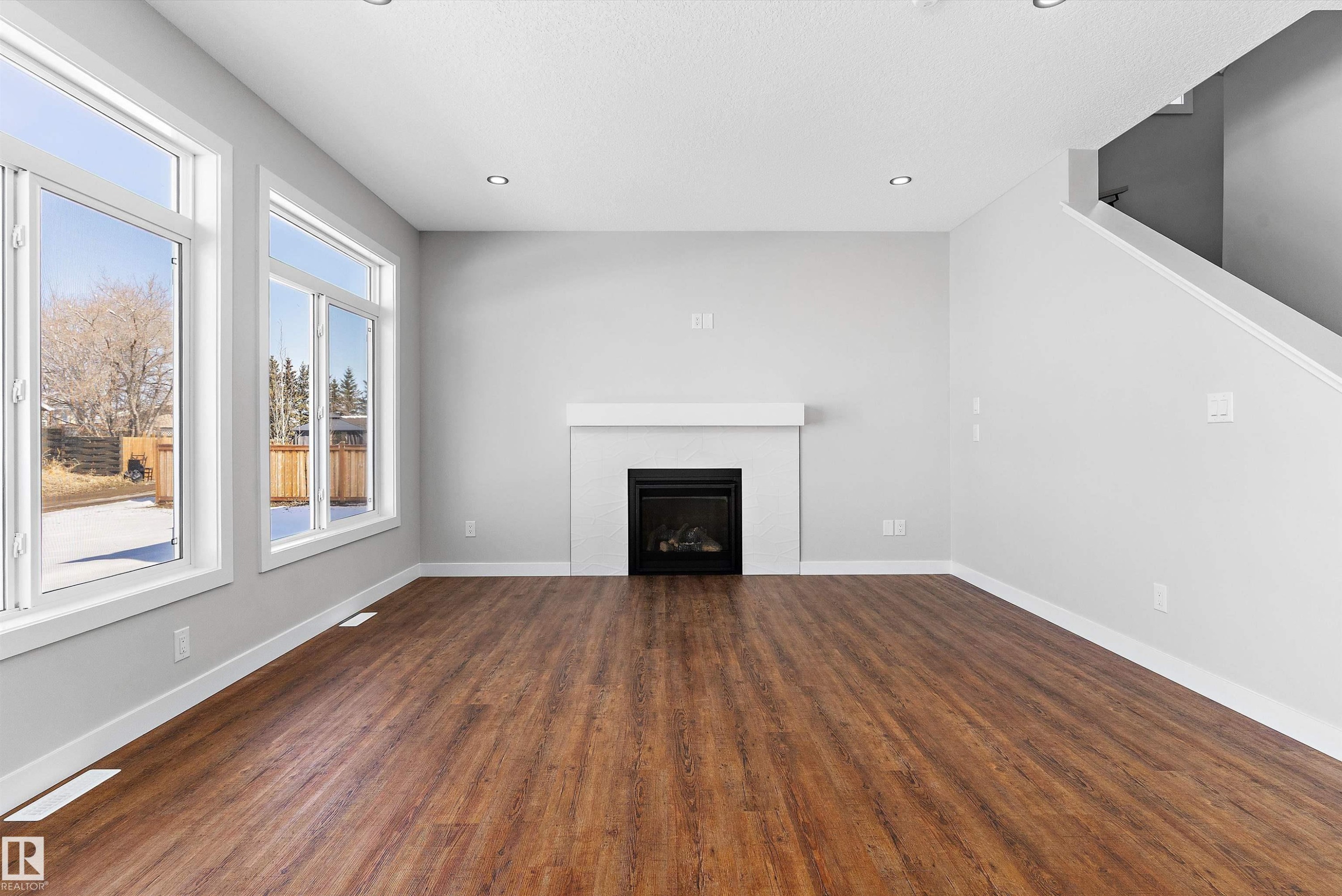 72 Maple Crescent, Gibbons, AB - Indoor Photo Showing Other Room With Fireplace