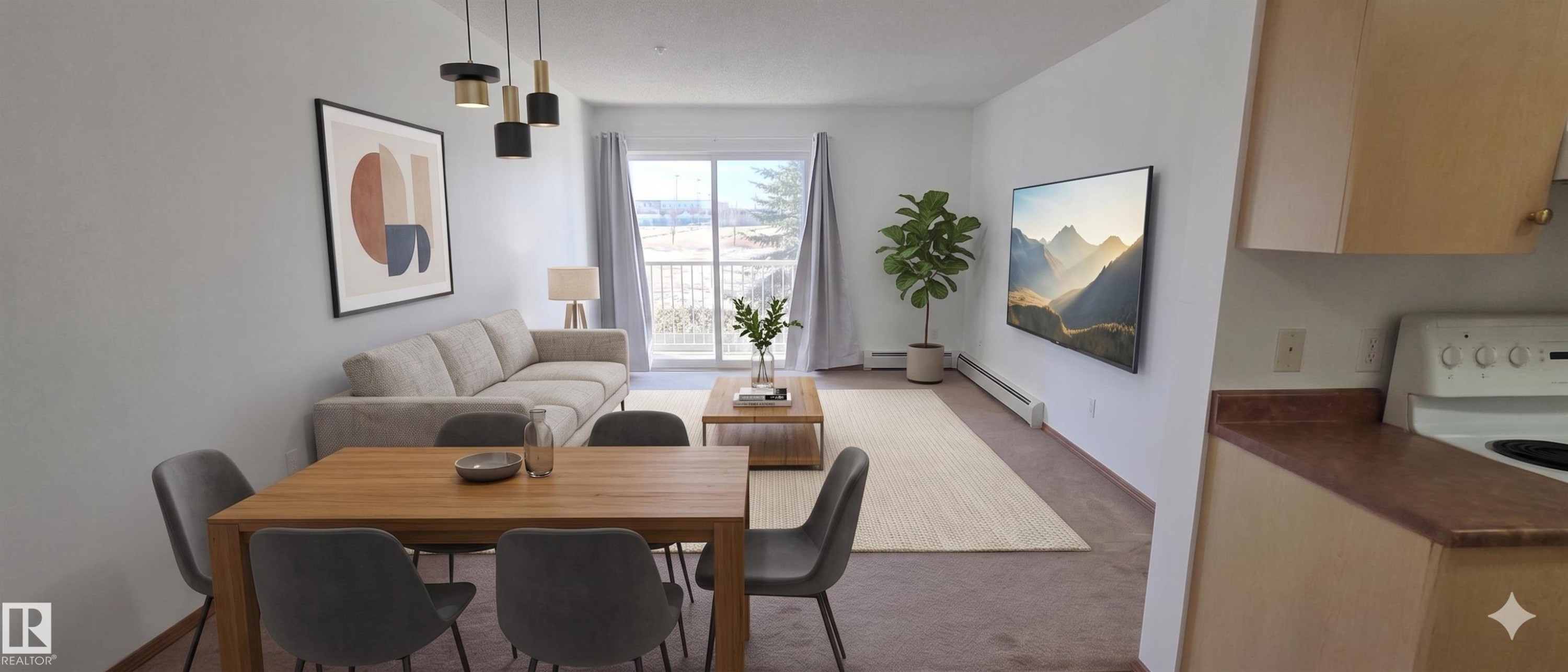 This open-concept living area features a dining space with a wooden table, overhead lighting, and a living area with a sliding glass door leading to a balcony - 208A 260 Spruce Ridge Road, Spruce Grove, AB - Indoor Photo Showing Dining Room