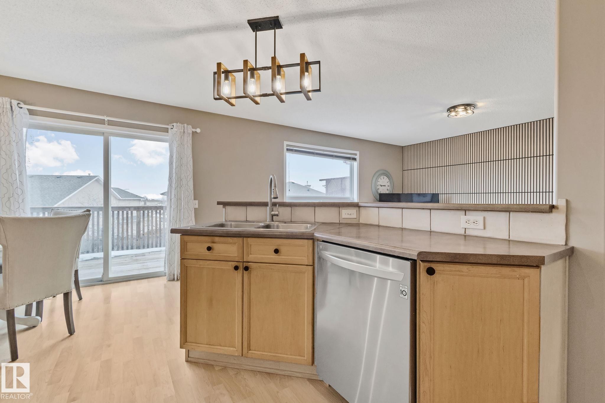 15117 Miller Boulevard, Edmonton, AB - Indoor Photo Showing Kitchen With Double Sink