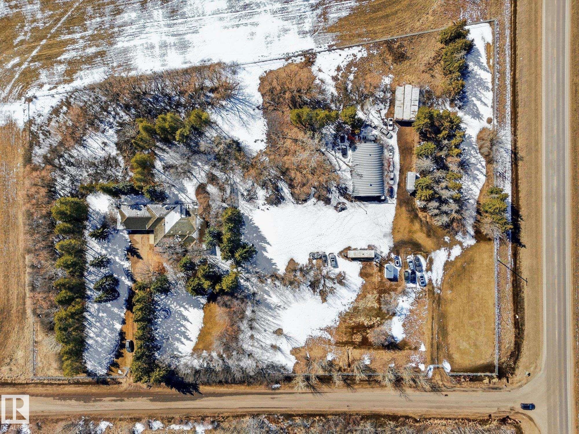 Aerial perspective showcasing a property with multiple structures - 25750 18 Street, Edmonton, AB - Outdoor With View