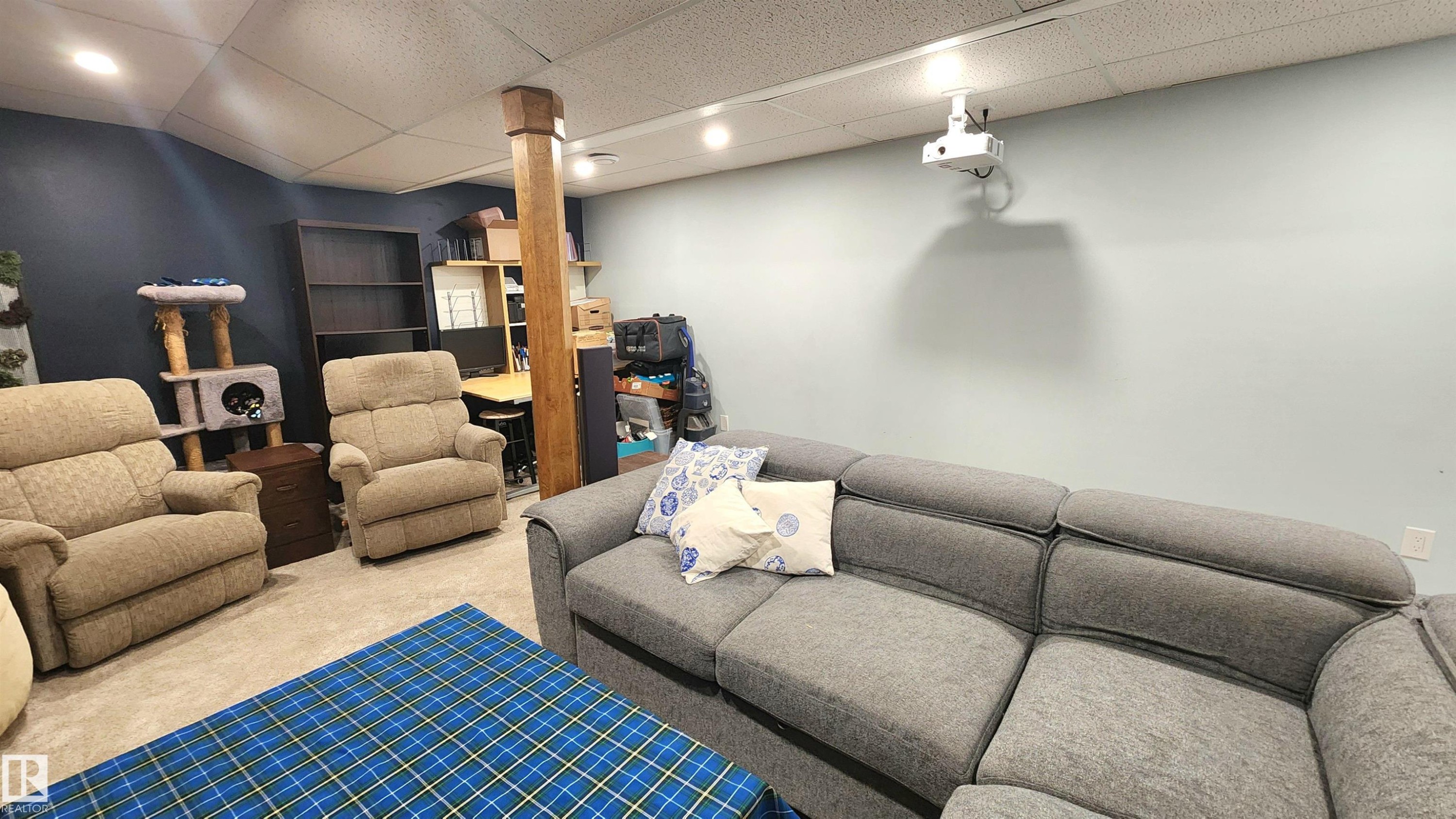 Recreational space featuring recessed lighting, a ceiling-mounted projector, and a carpeted floor - 3531 46 Street, Edmonton, AB - Indoor