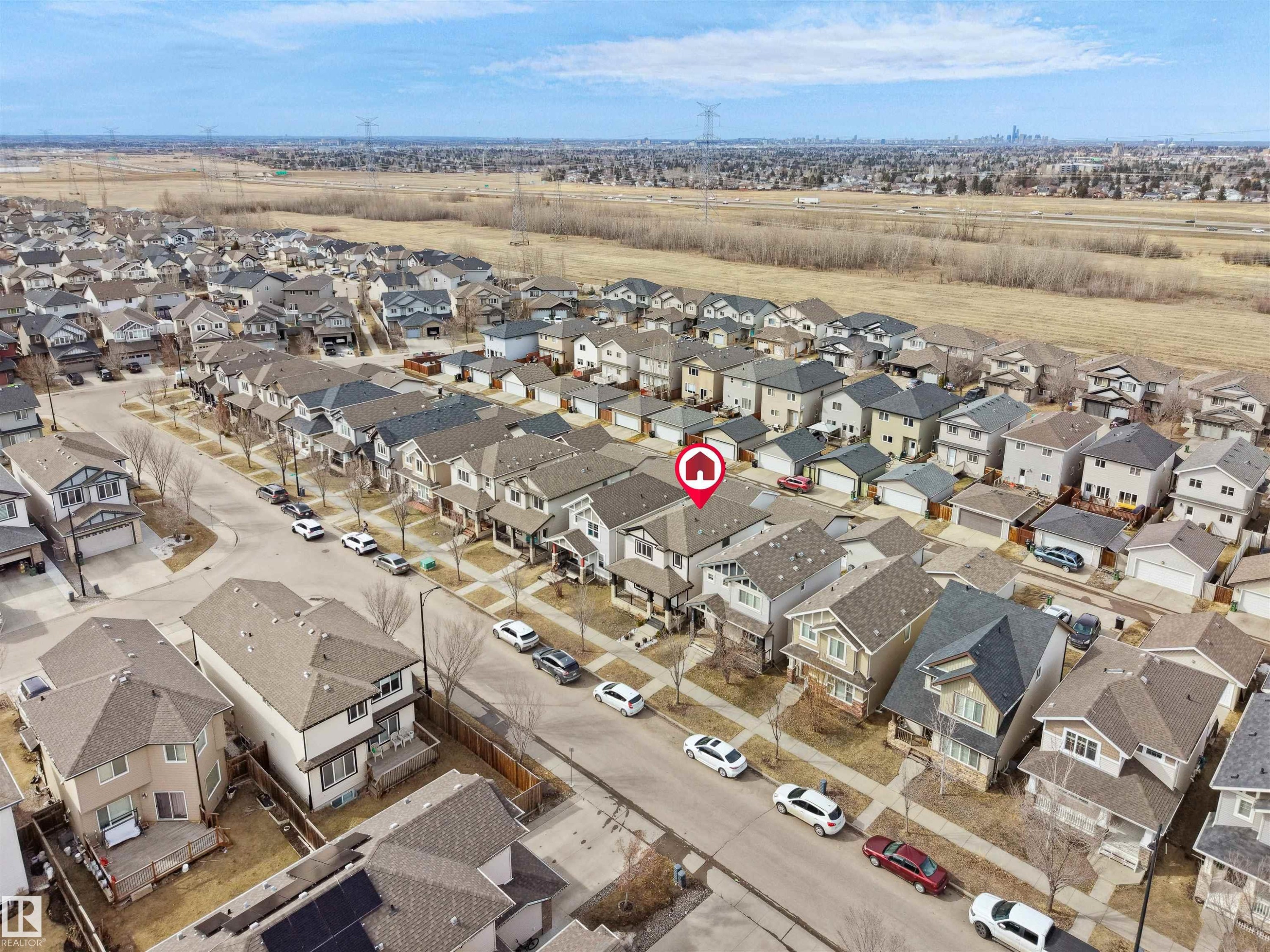 Aerial perspective showcasing a residential street with detached homes - 5192 1B Avenue Sw, Edmonton, AB - Outdoor With View