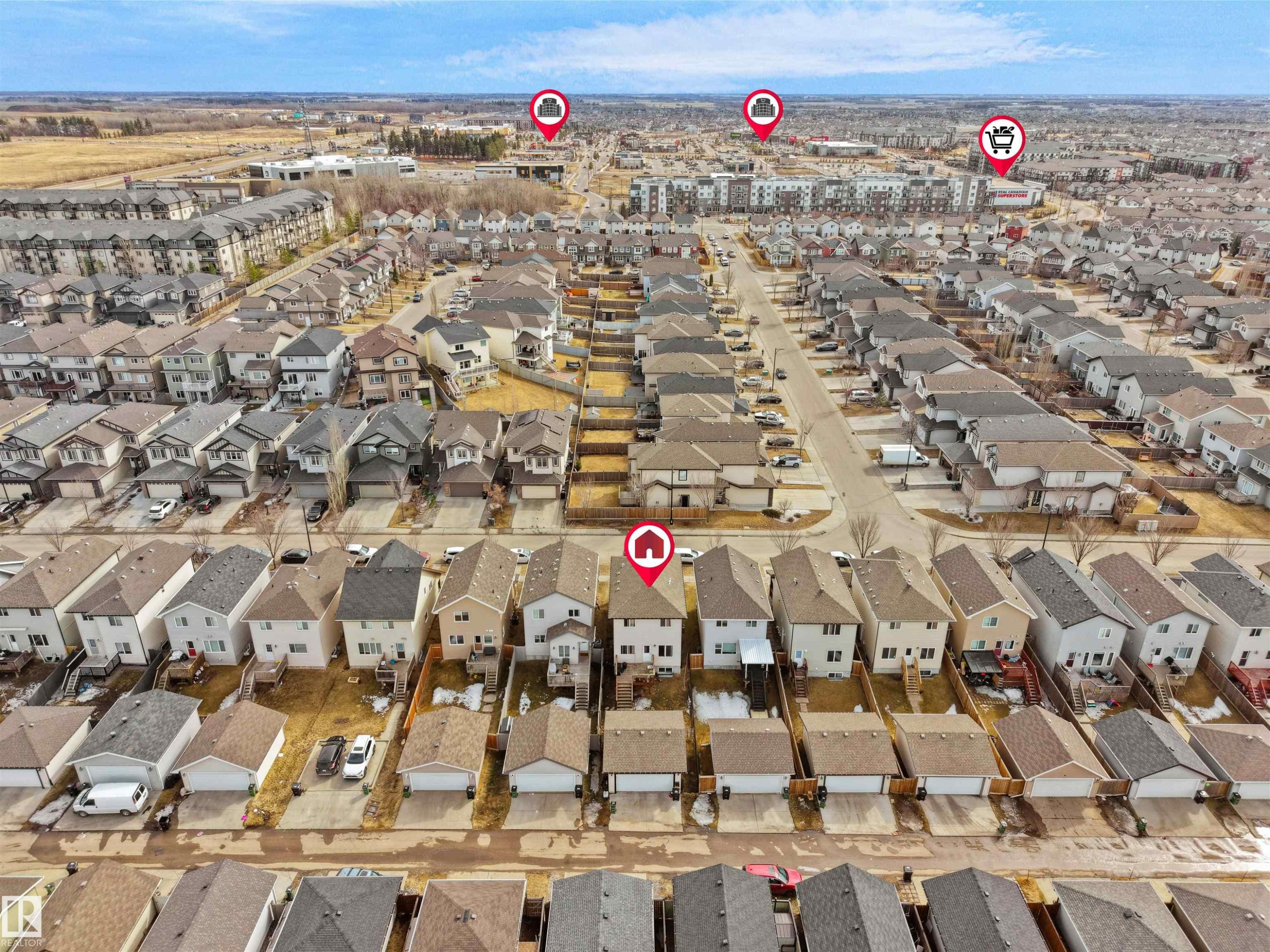 Aerial perspective showcasing a residential development with multiple detached and attached homes - 5192 1B Avenue Sw, Edmonton, AB - Outdoor With View