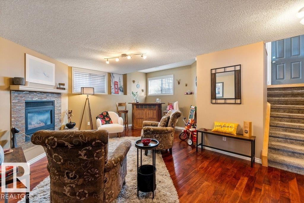 17 Donald Place, St. Albert, AB - Indoor Photo Showing Living Room With Fireplace
