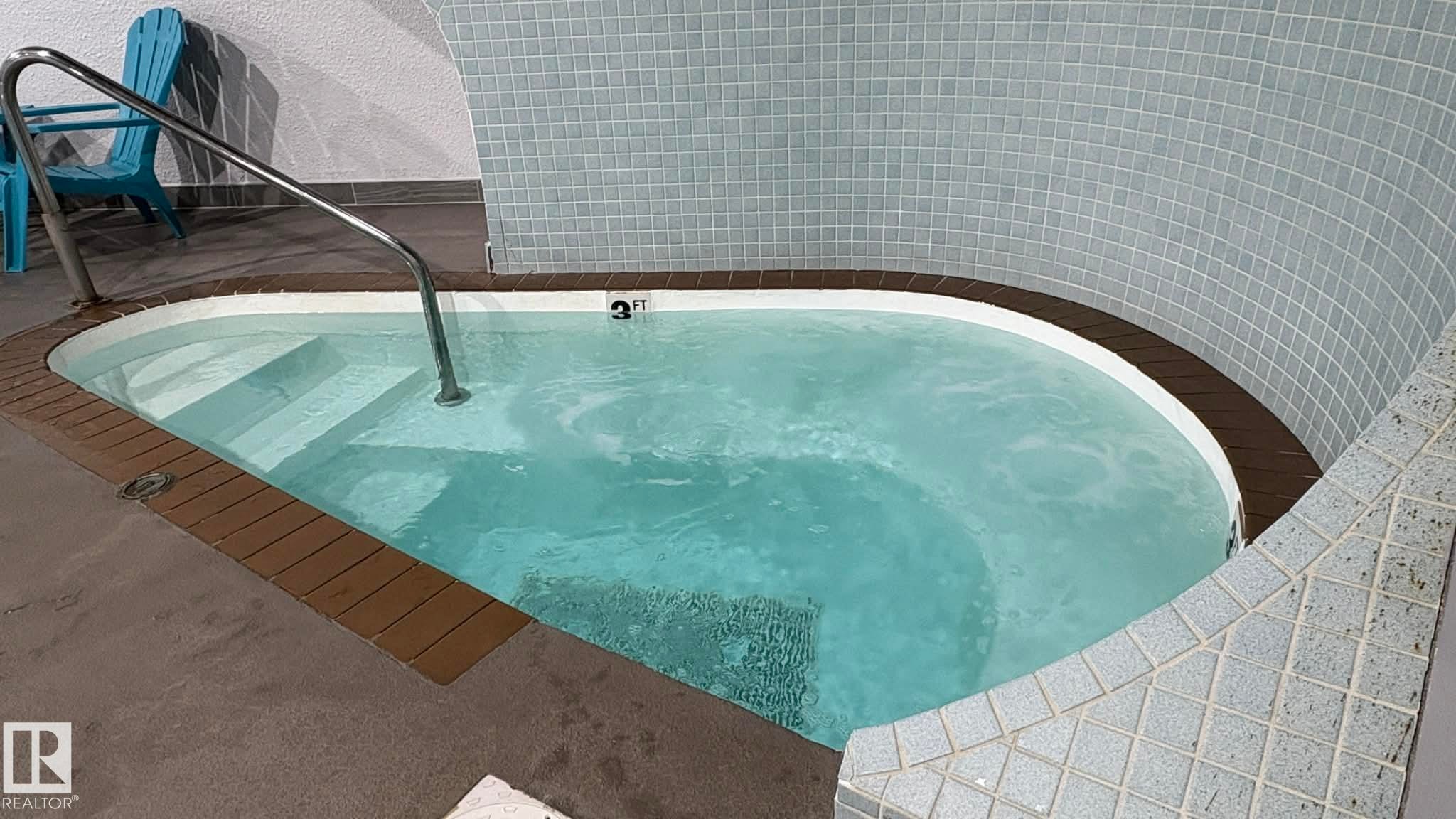 203 5125 Riverbend Road, Edmonton, AB - Indoor Photo Showing Other Room With In Ground Pool