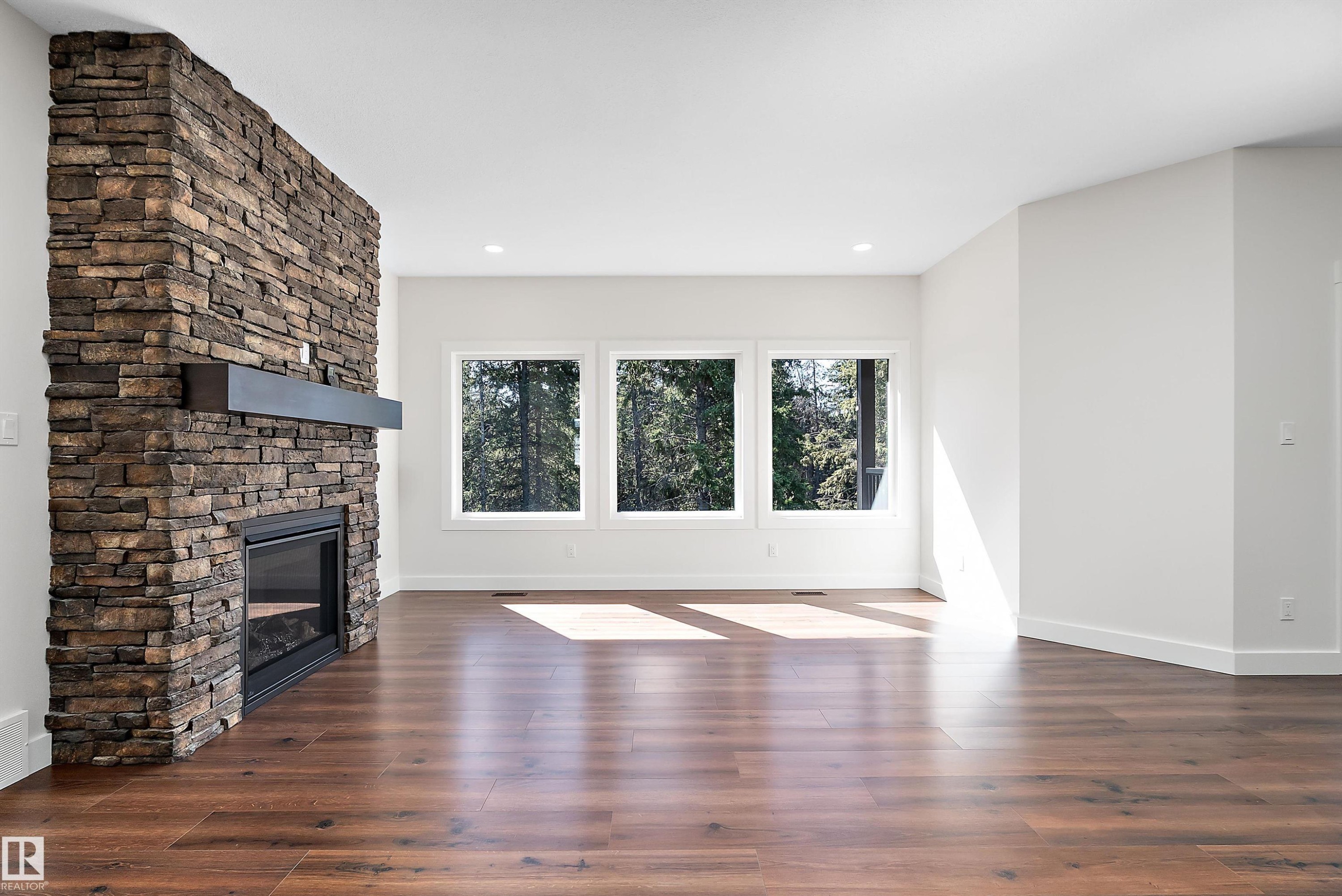 131 Bela Drive, Millet, AB - Indoor Photo Showing Living Room With Fireplace