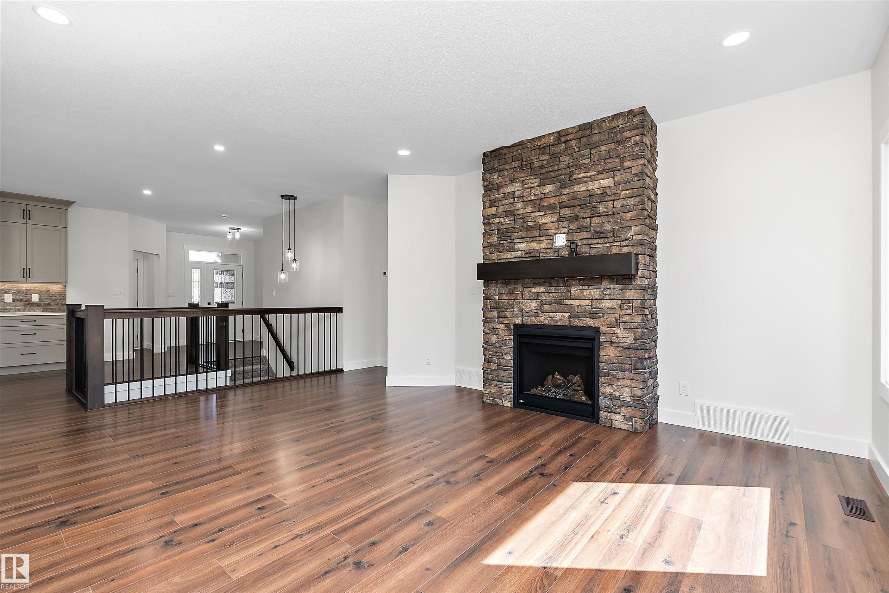 131 Bela Drive, Millet, AB - Indoor Photo Showing Living Room With Fireplace