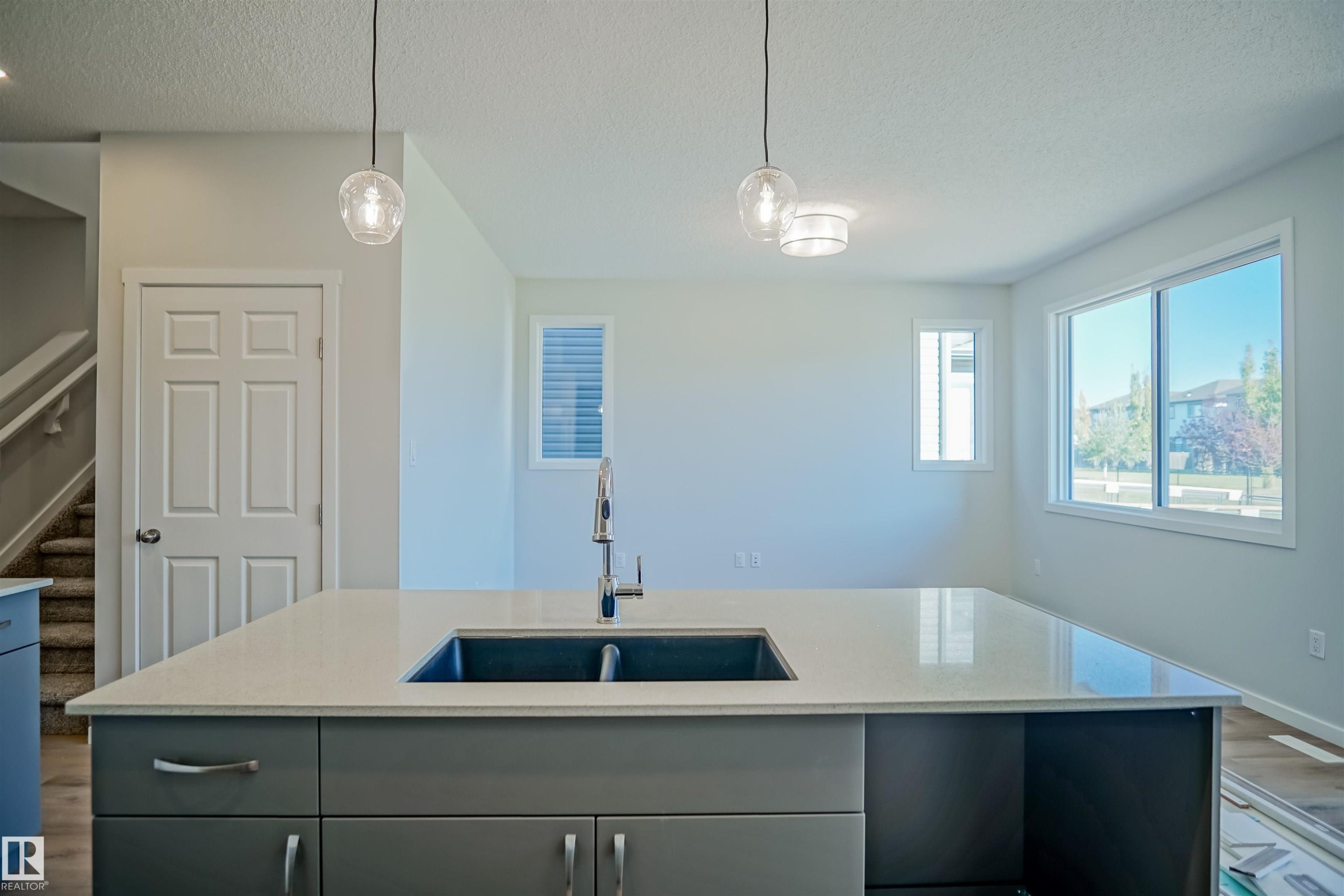 938 18 Avenue, Edmonton, AB - Indoor Photo Showing Kitchen With Double Sink