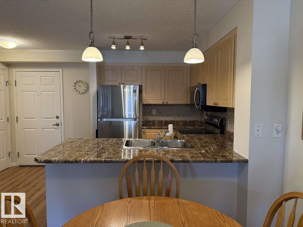 113 616 Mcallister Loop, Edmonton, AB - Indoor Photo Showing Kitchen With Double Sink With Upgraded Kitchen
