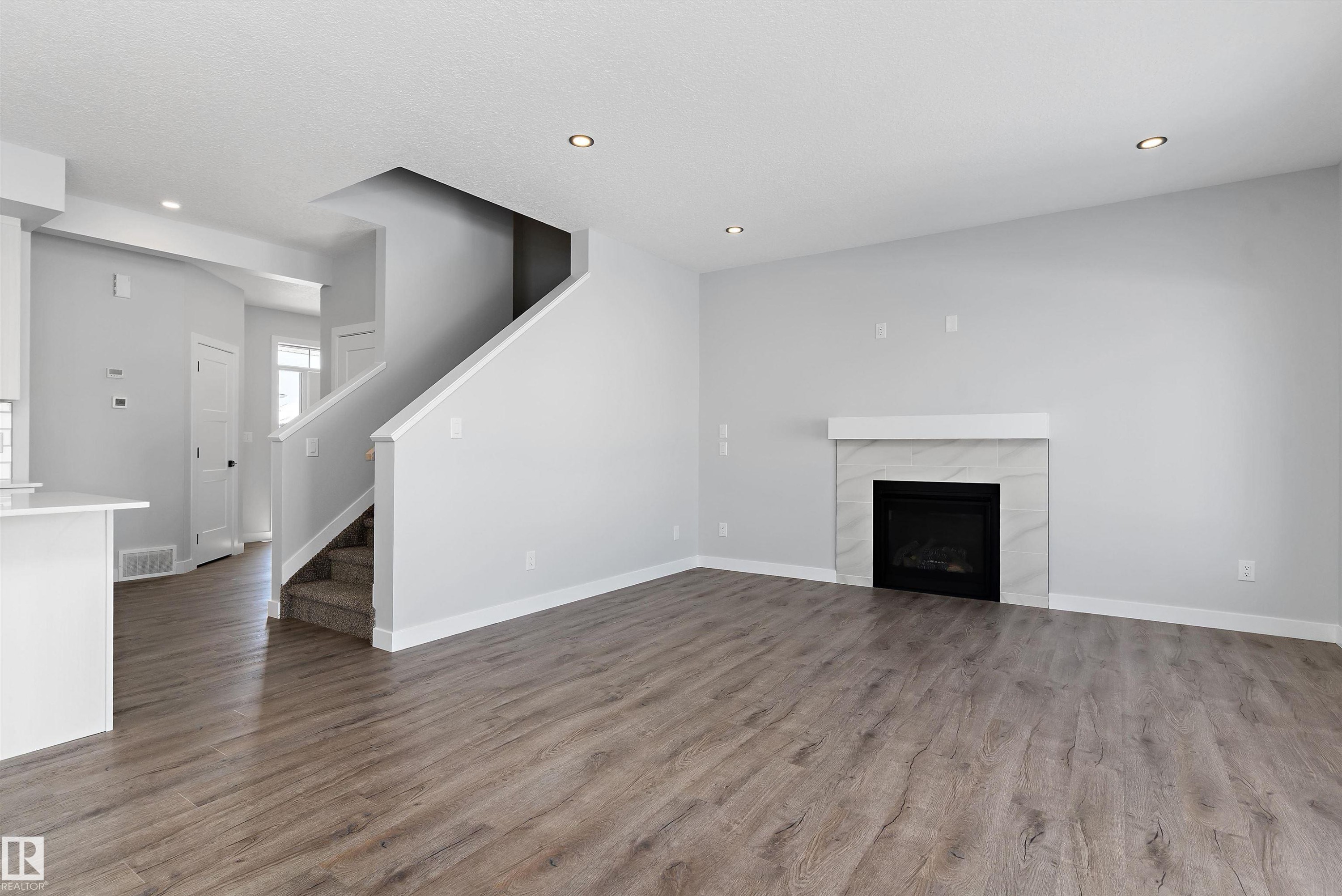 76 Maple Crescent, Gibbons, AB - Indoor With Fireplace