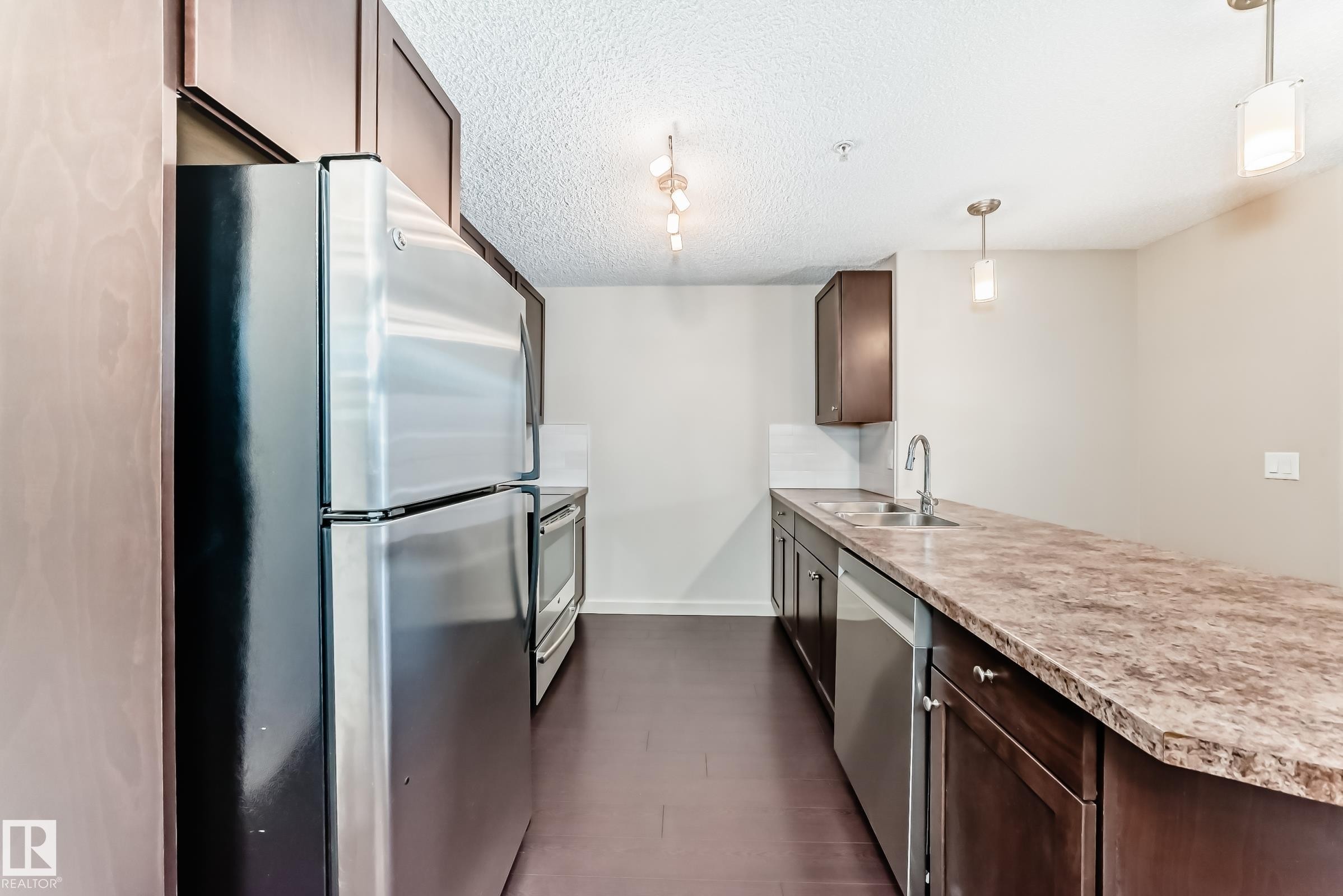 229 6076 Schonsee Way, Edmonton, AB - Indoor Photo Showing Kitchen With Double Sink