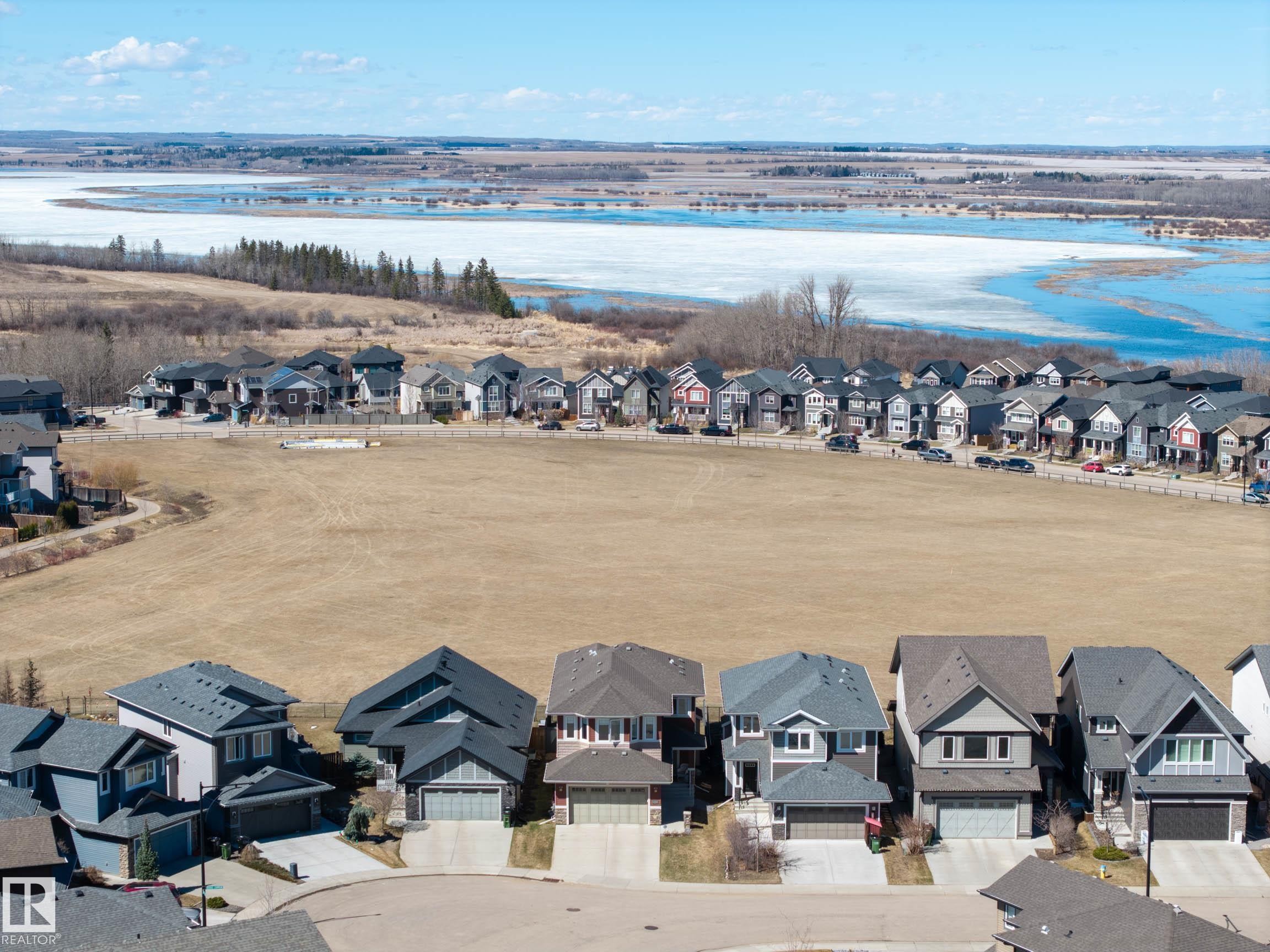 Residential development featuring contemporary homes with attached garages - 2086 Redtail Common, Edmonton, AB - Outdoor With View