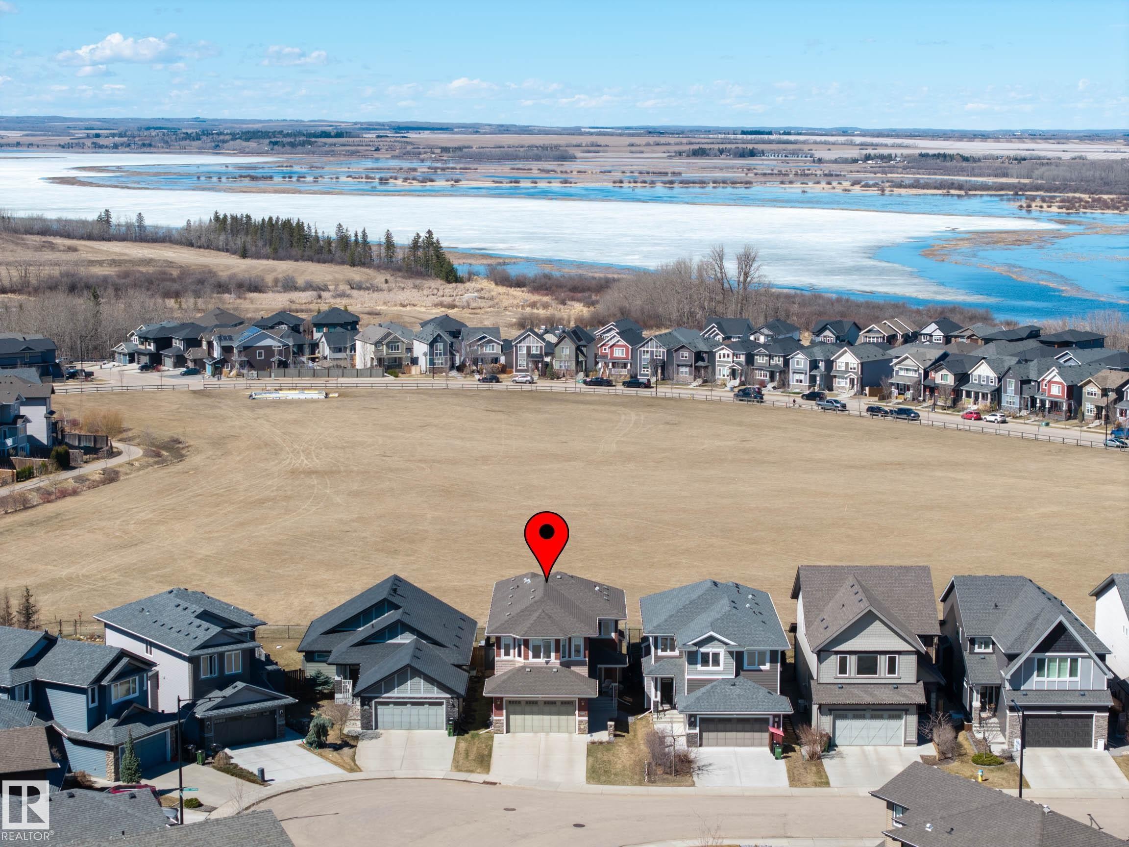 Residential property featuring a light-colored exterior and a dark roof - 2086 Redtail Common, Edmonton, AB - Outdoor With View