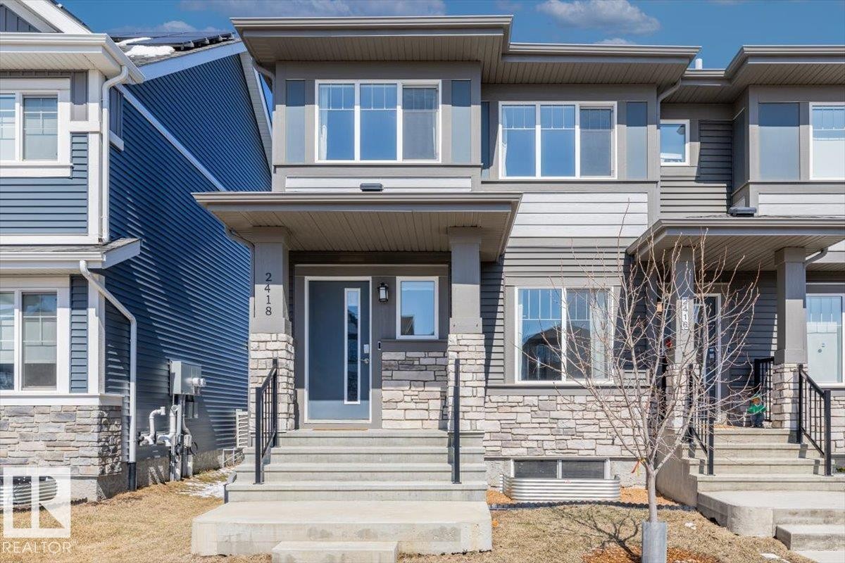 2418 Trumpeter Way, Edmonton, AB - Outdoor With Facade
