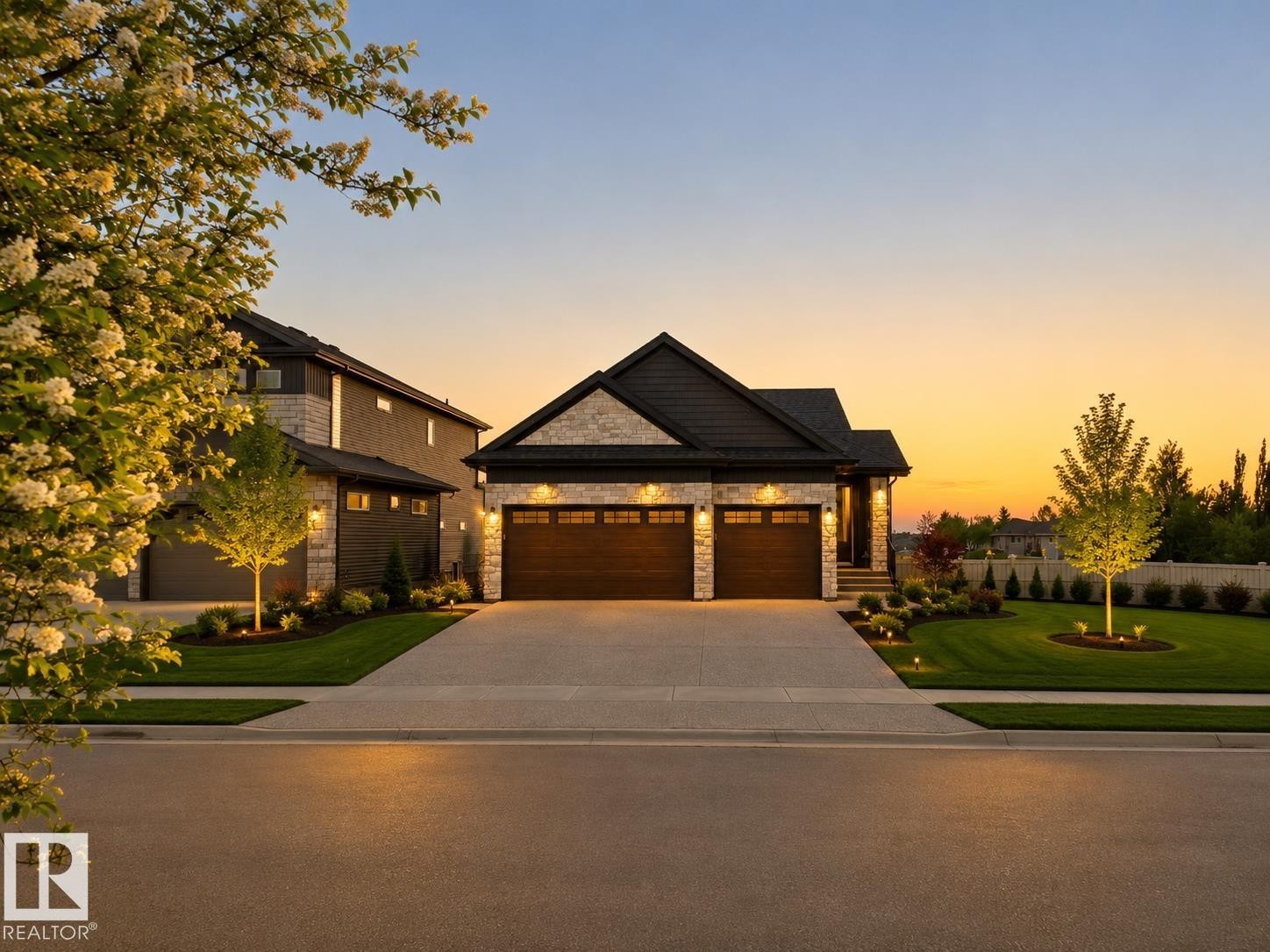 Contemporary residence featuring a stone and dark siding facade - 149 Eastgate Way, St. Albert, AB - Outdoor