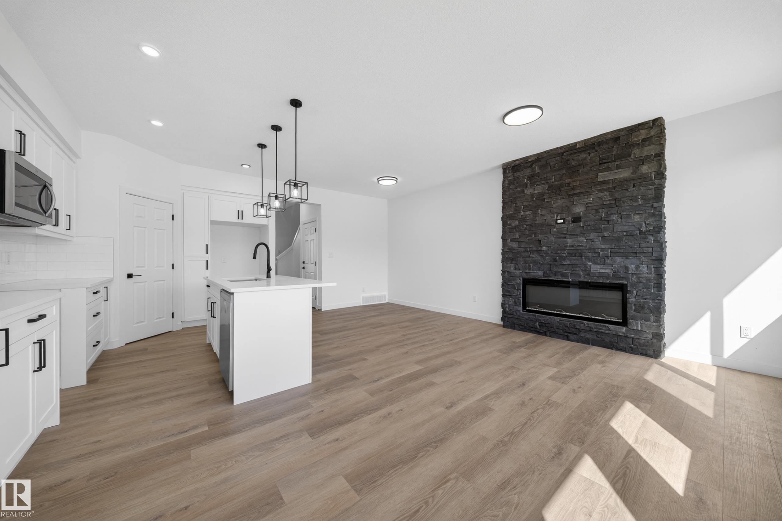 227 Deer Valley Drive, Leduc, AB - Indoor With Fireplace