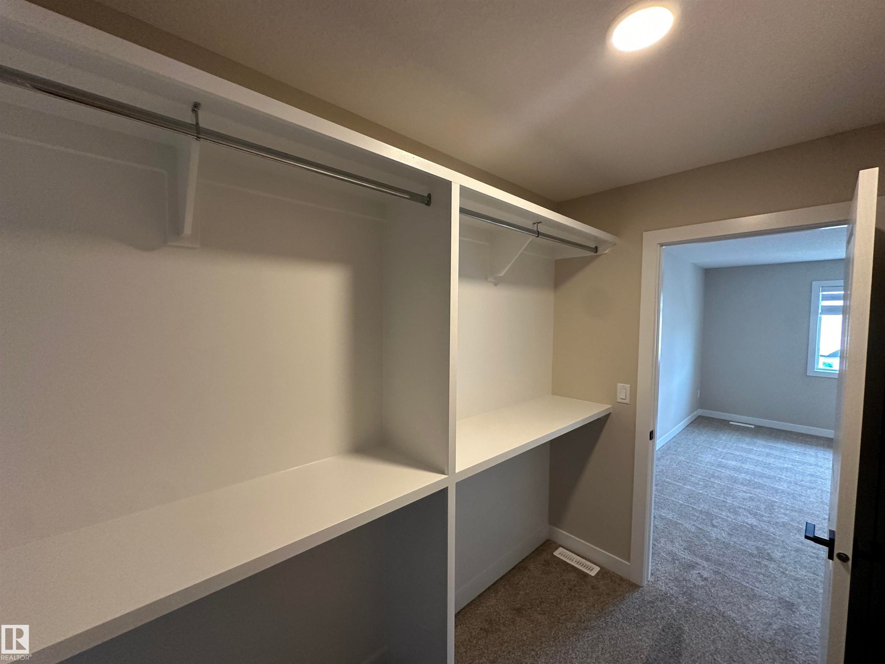 227 Ravine Drive, Devon, AB - Indoor With Storage