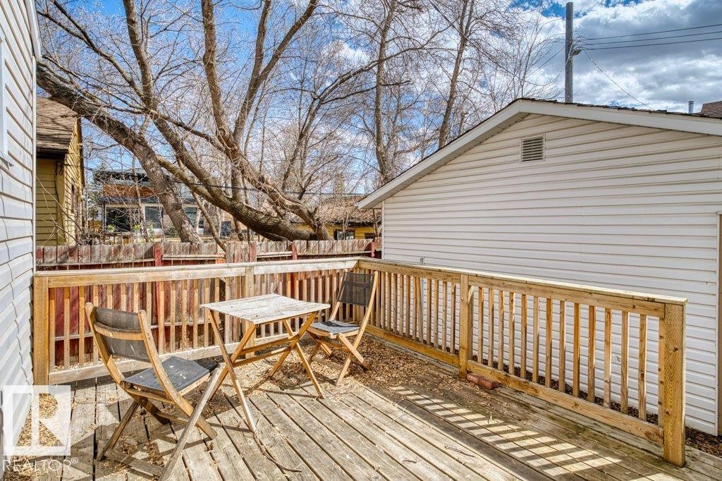 Wood deck with natural wood railing - 12207 110 Avenue, Edmonton, AB - Outdoor With Deck Patio Veranda With Exterior