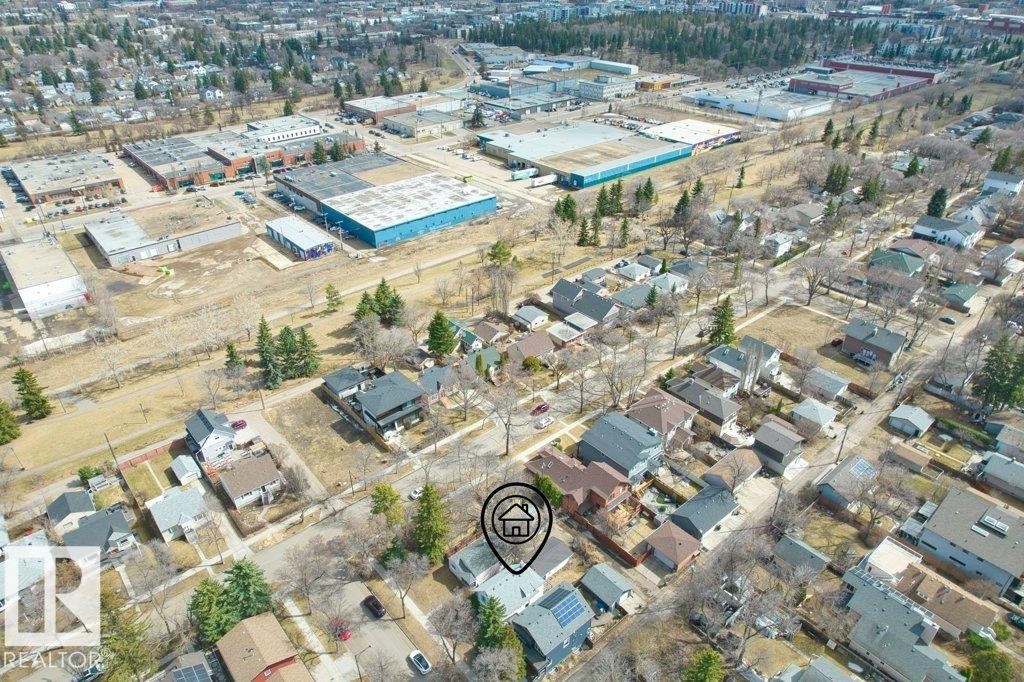 Aerial perspective highlighting a residential street with diverse housing styles - 12207 110 Avenue, Edmonton, AB - With View