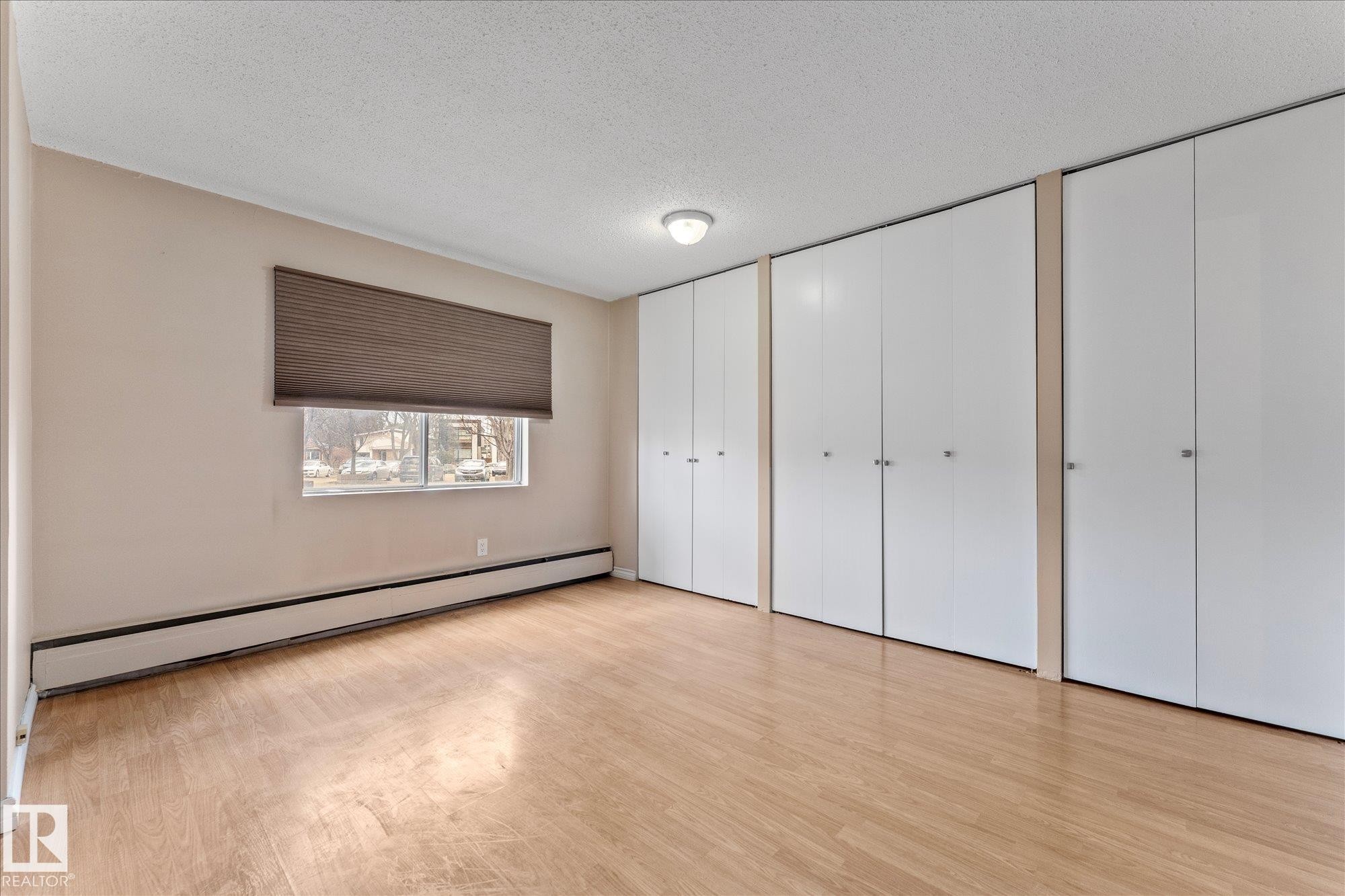 102 13910 Stony Plain Road, Edmonton, AB - Indoor Photo Showing Other Room