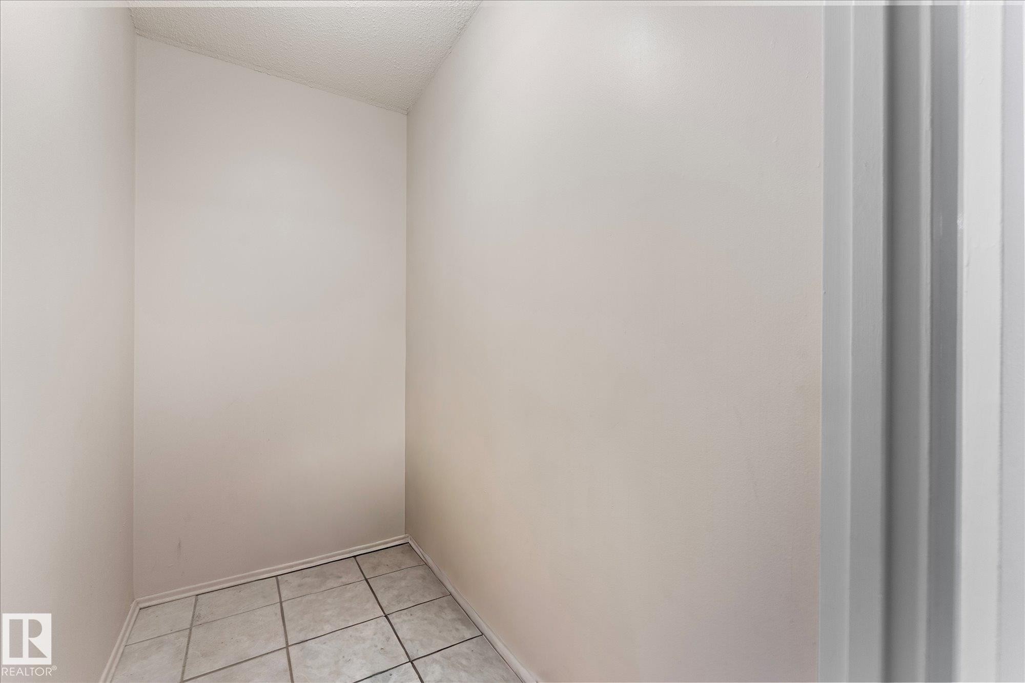 102 13910 Stony Plain Road, Edmonton, AB - Indoor Photo Showing Other Room