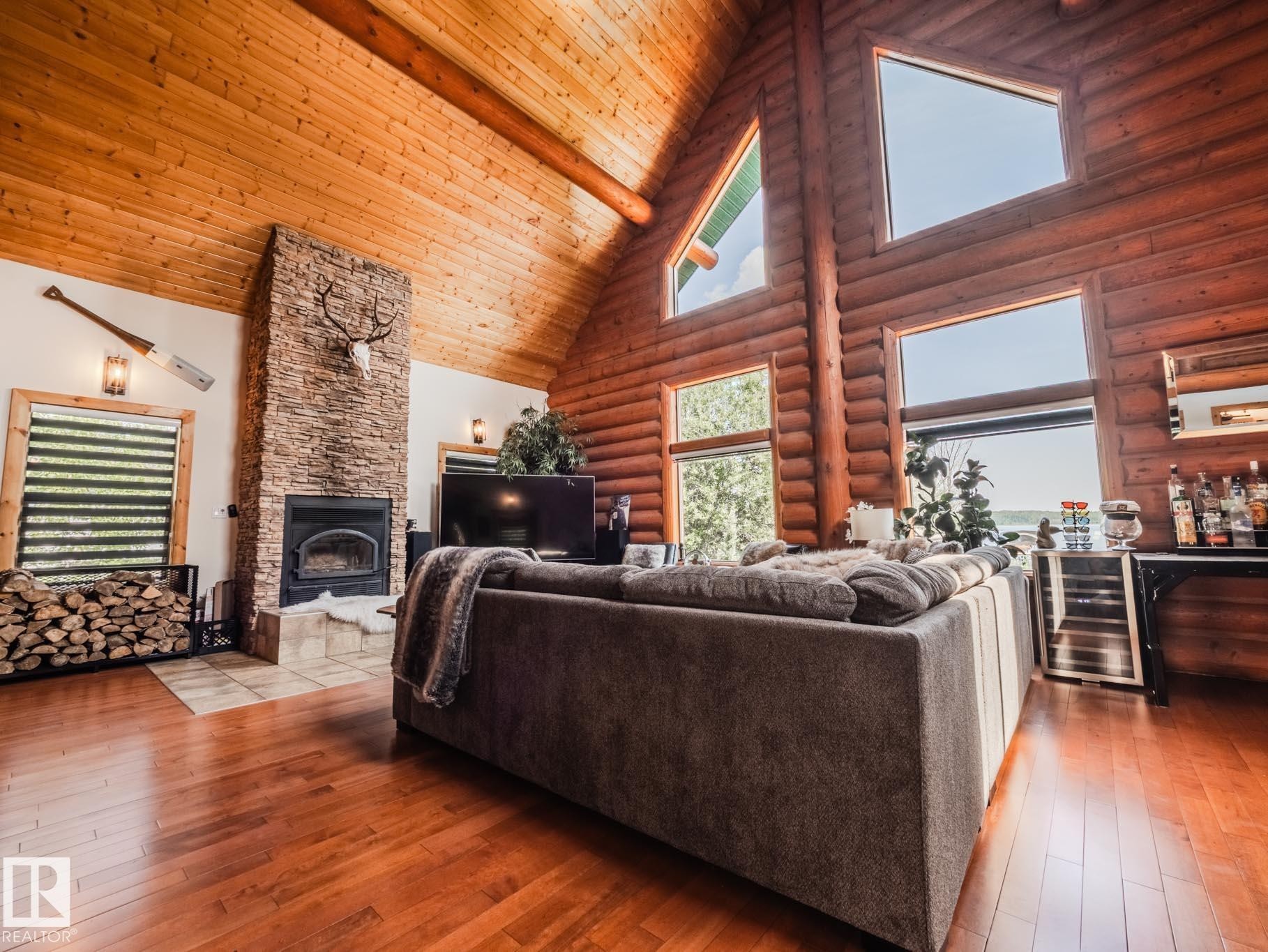 213 Lakeshore Drive, Rural Athabasca County, AB - Indoor Photo Showing Living Room With Fireplace