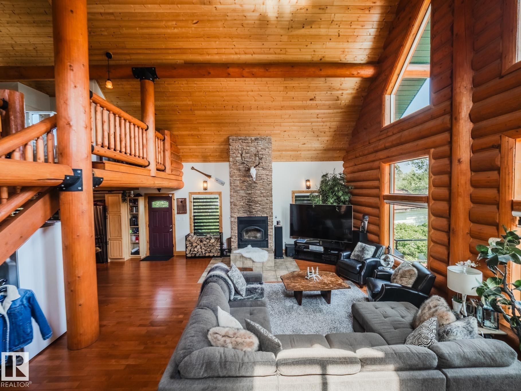 213 Lakeshore Drive, Rural Athabasca County, AB - Indoor Photo Showing Living Room With Fireplace