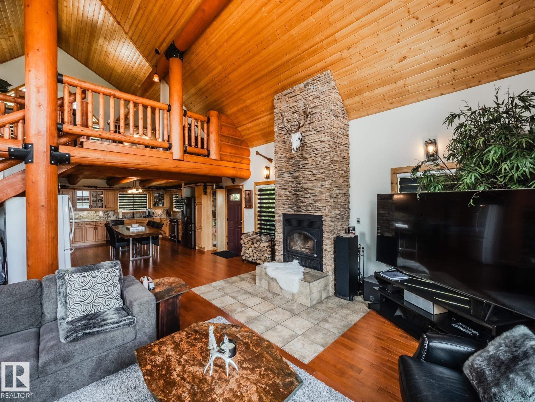 213 Lakeshore Drive, Rural Athabasca County, AB - Indoor Photo Showing Living Room With Fireplace
