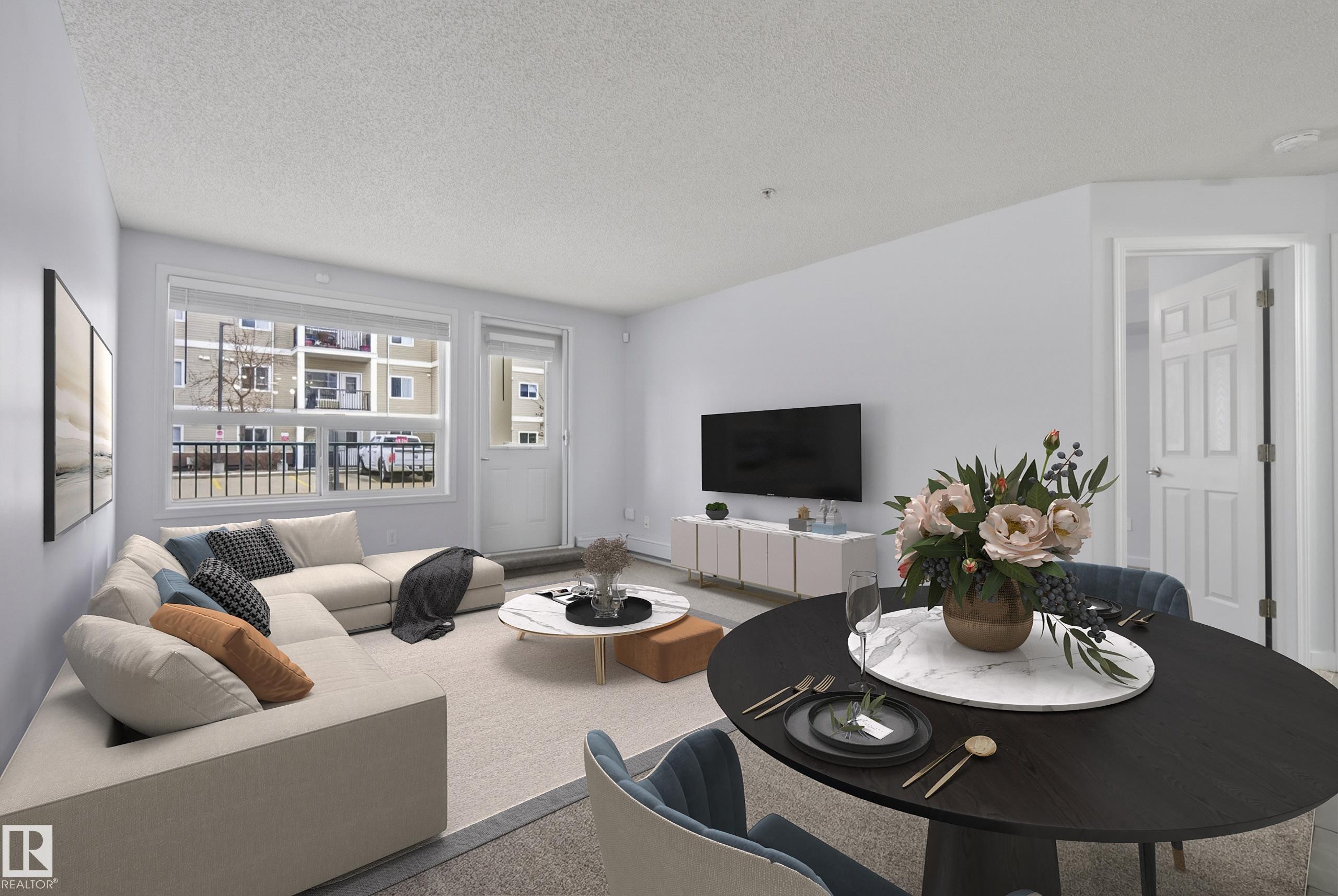 #113 13625 34 St Nw, Edmonton, AB - Indoor Photo Showing Living Room