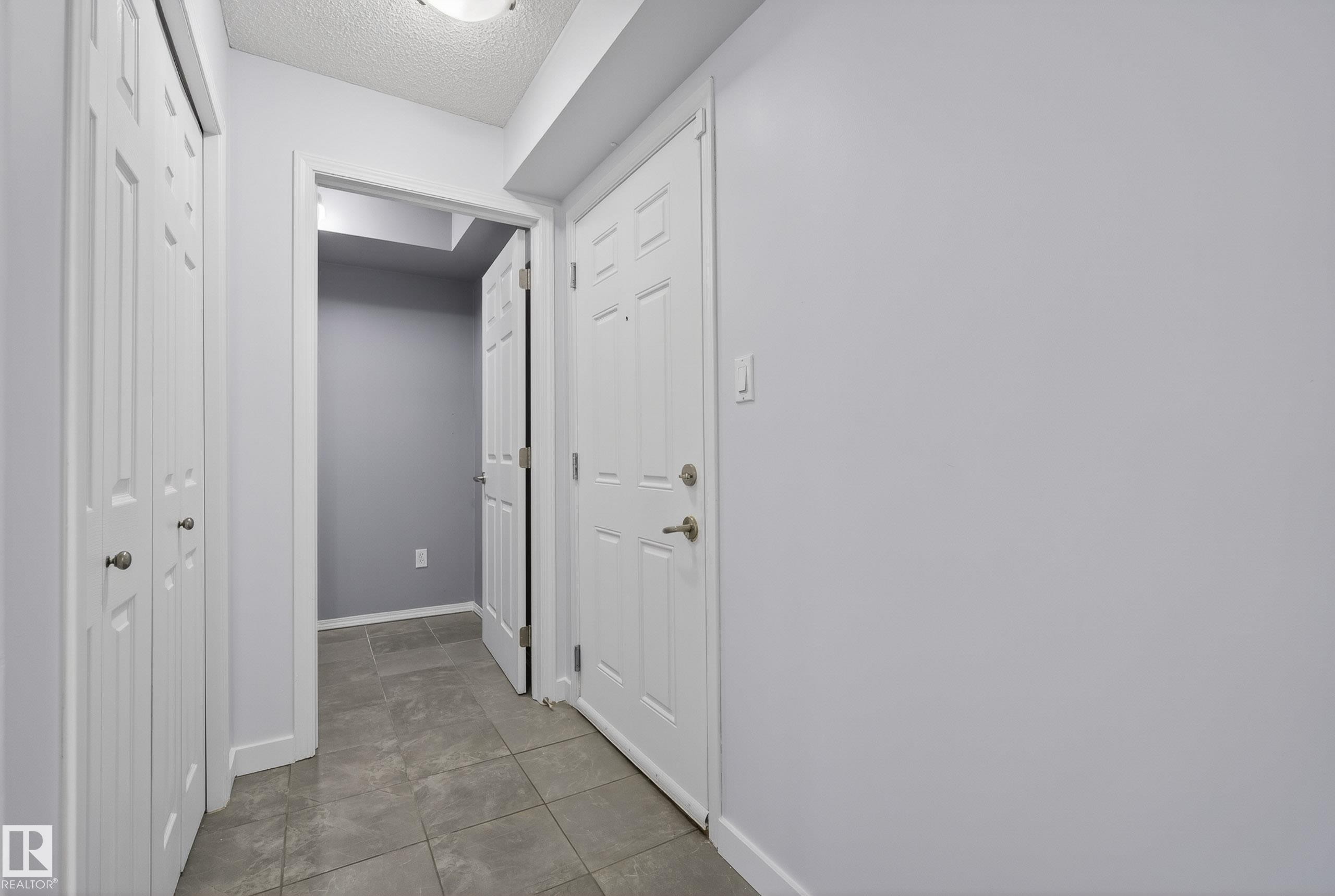 #113 13625 34 St Nw, Edmonton, AB - Indoor Photo Showing Other Room
