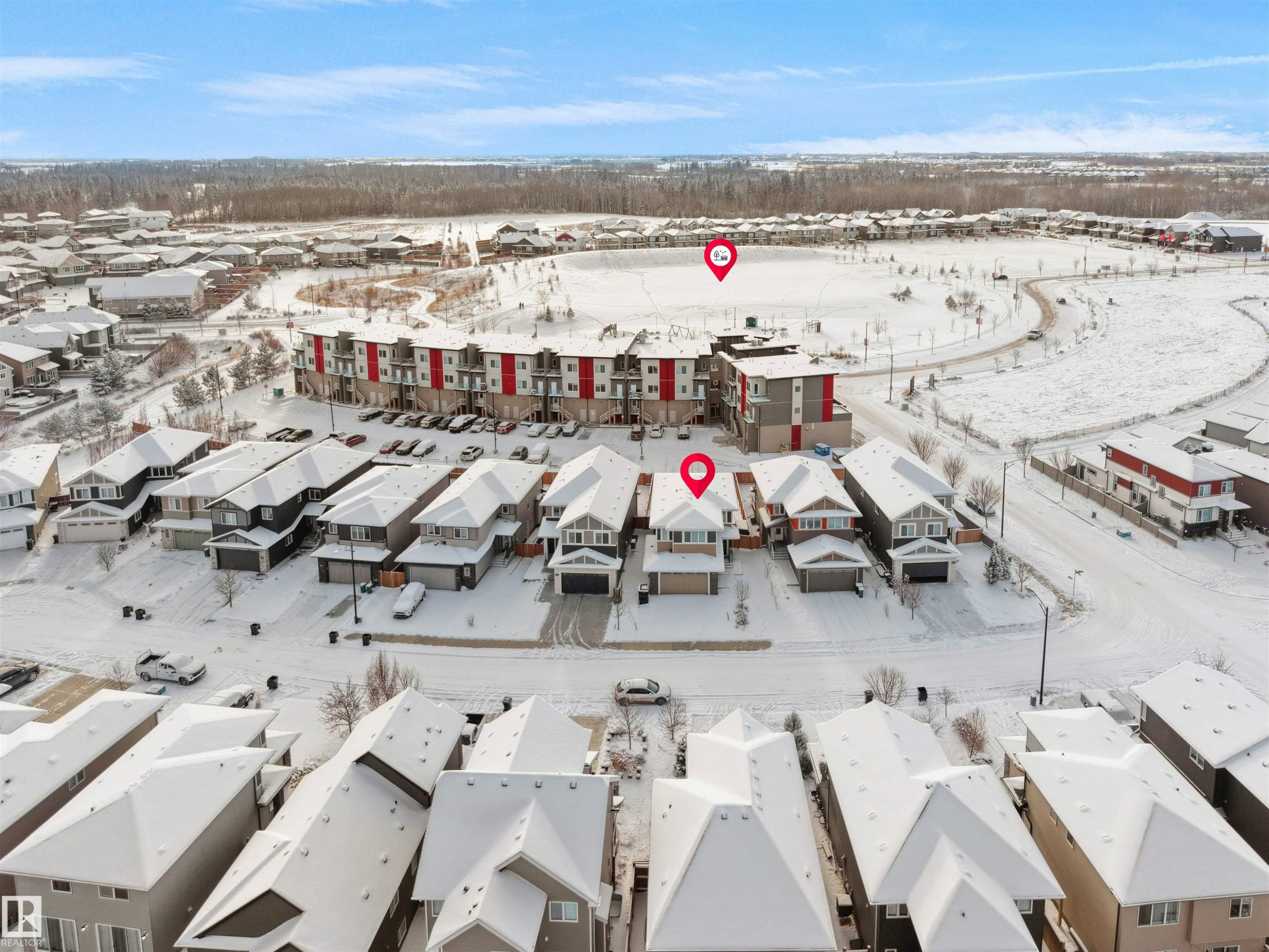 Aerial view of residential neighborhood with single-family homes and multi-story buildings - 20827 130 Avenue Nw, Edmonton, AB - Outdoor With View