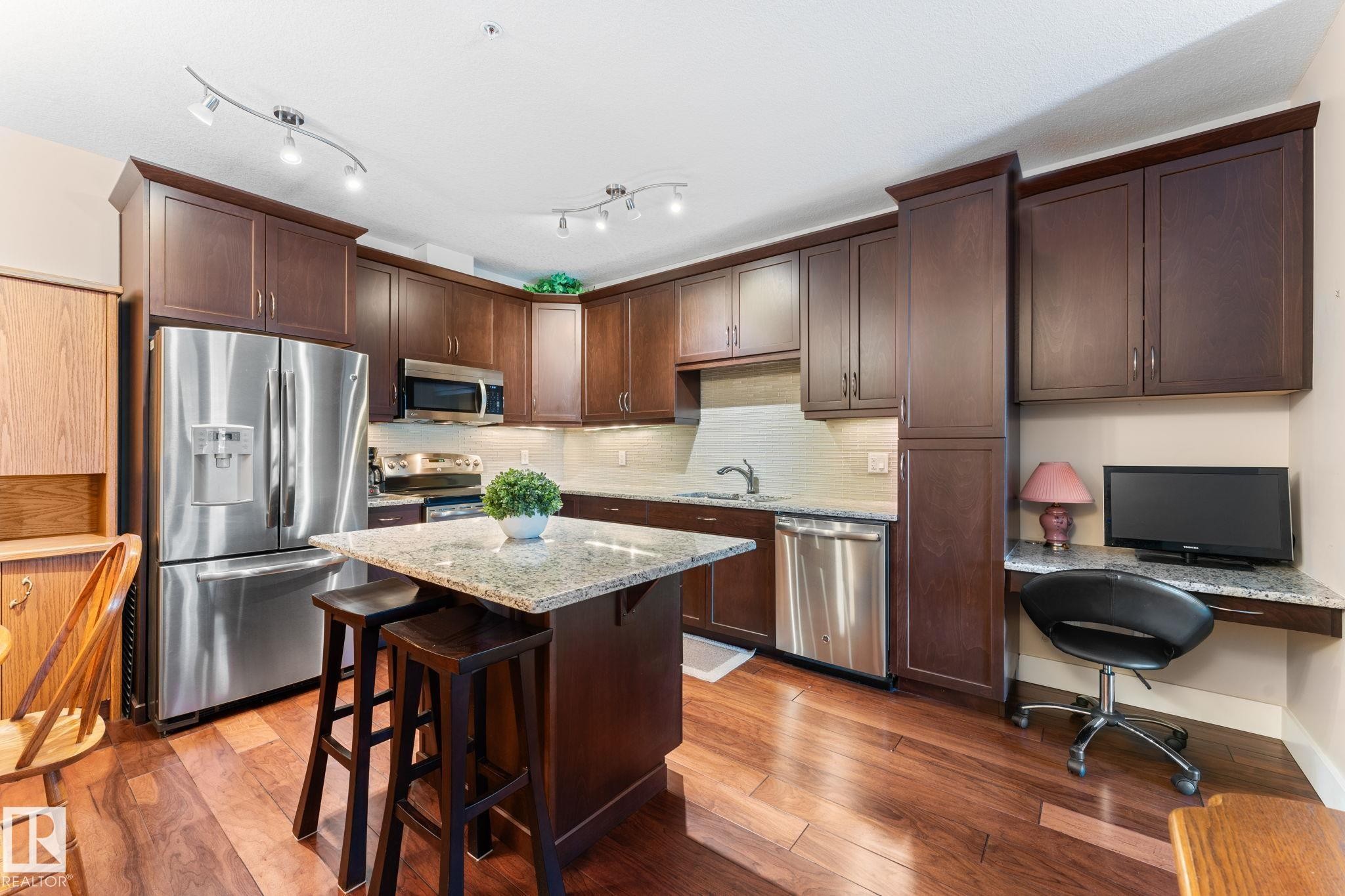 251 6079 Maynard Way, Edmonton, AB - Indoor Photo Showing Kitchen With Stainless Steel Kitchen