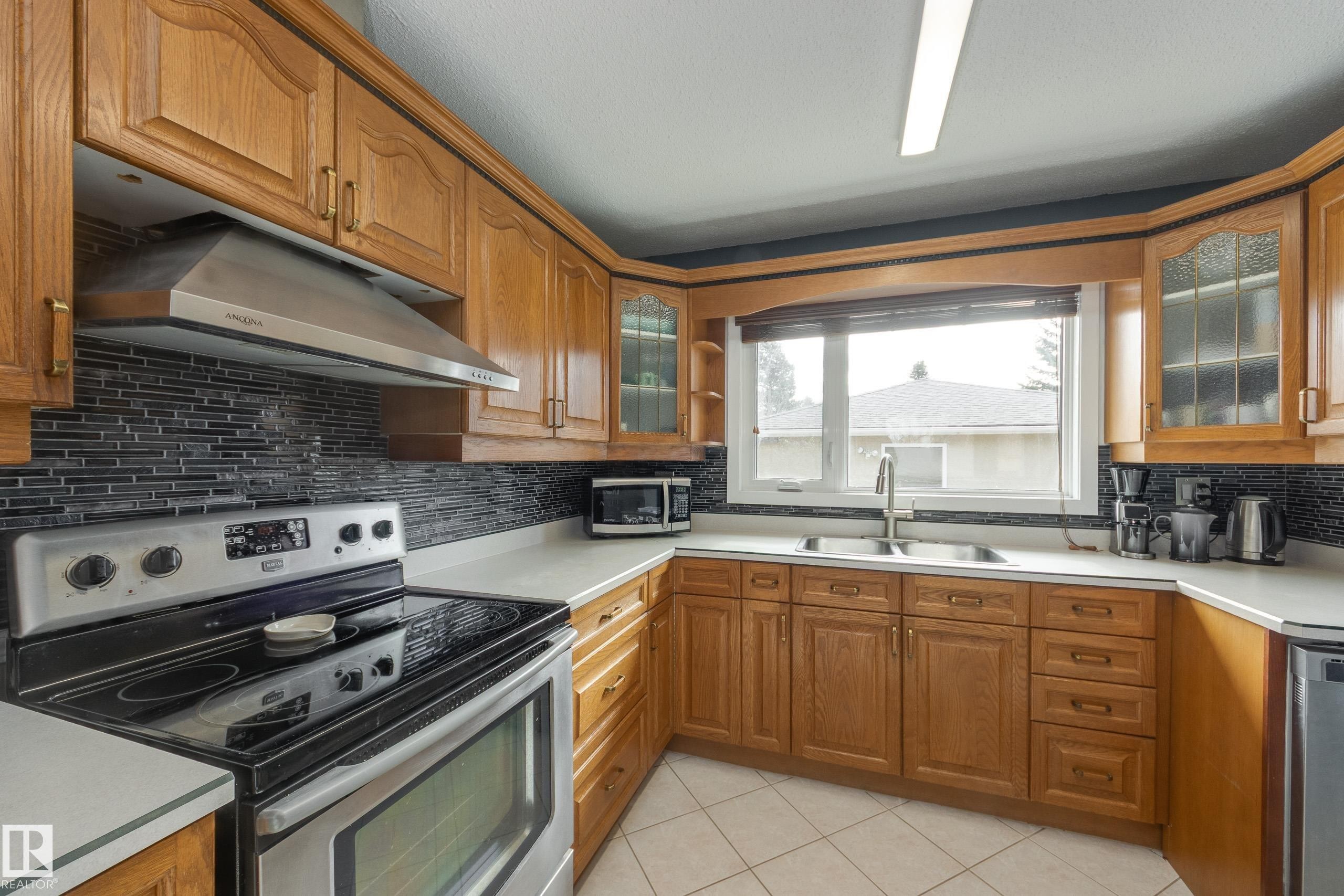 14227 74 Street, Edmonton, AB - Indoor Photo Showing Kitchen With Stainless Steel Kitchen With Double Sink